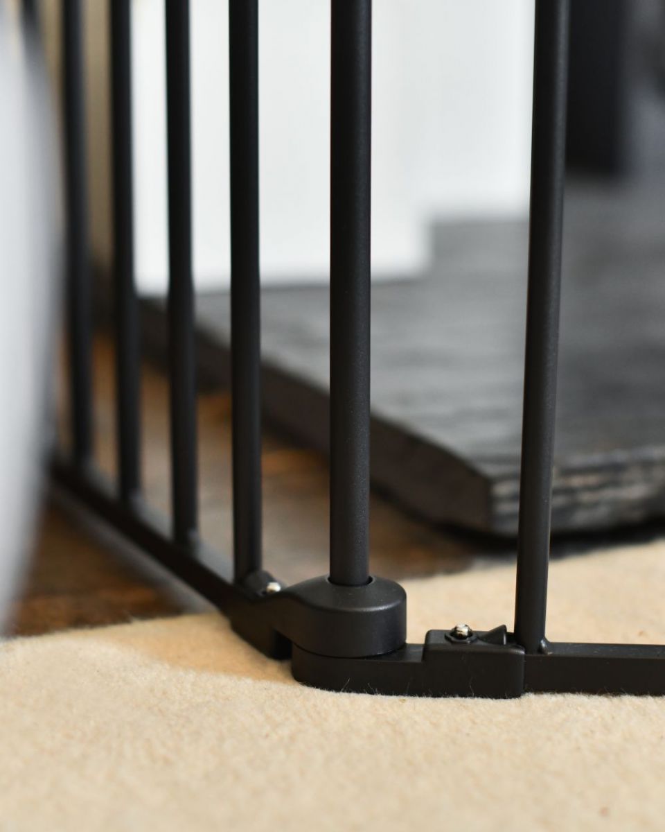 Close up of Five Panel Fire Surround Baby Guard corner hinge Close up of Five Panel Fire Surround Baby Guard corner hinge