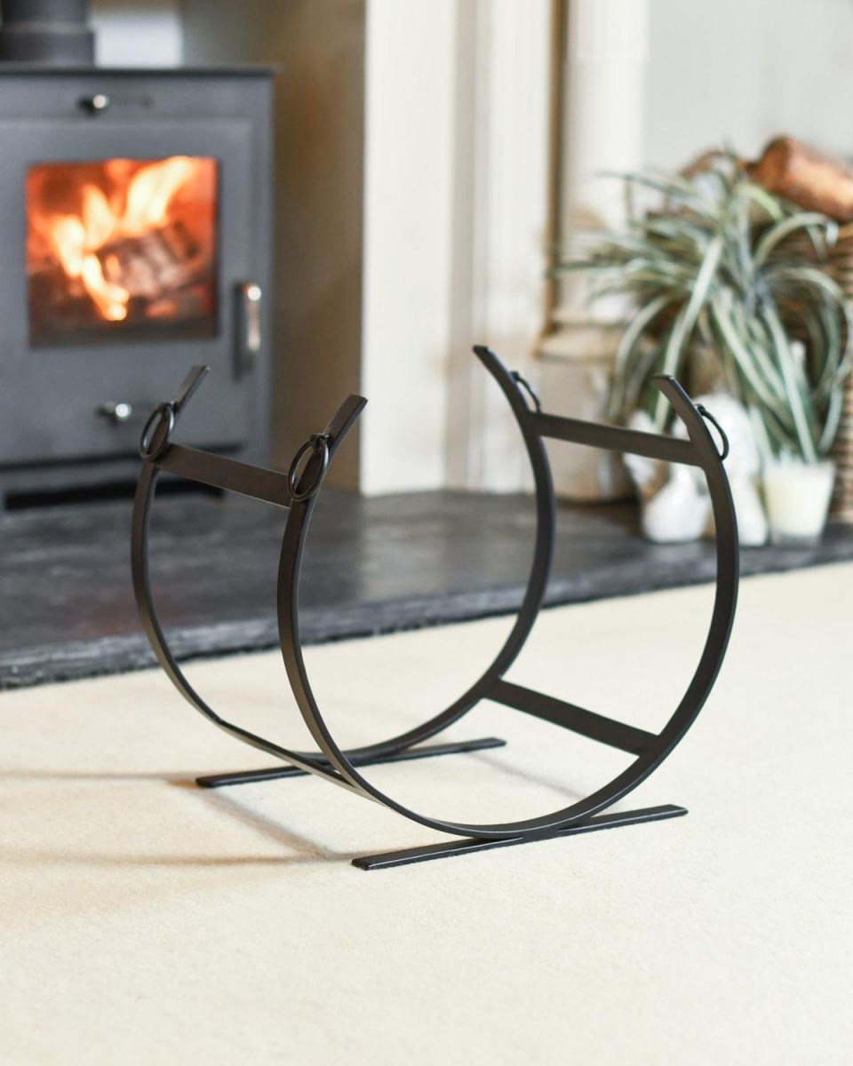 Empty Black Blacksmith Curved Log Rack In Situ Empty Black Blacksmith Curved Log Rack In Situ