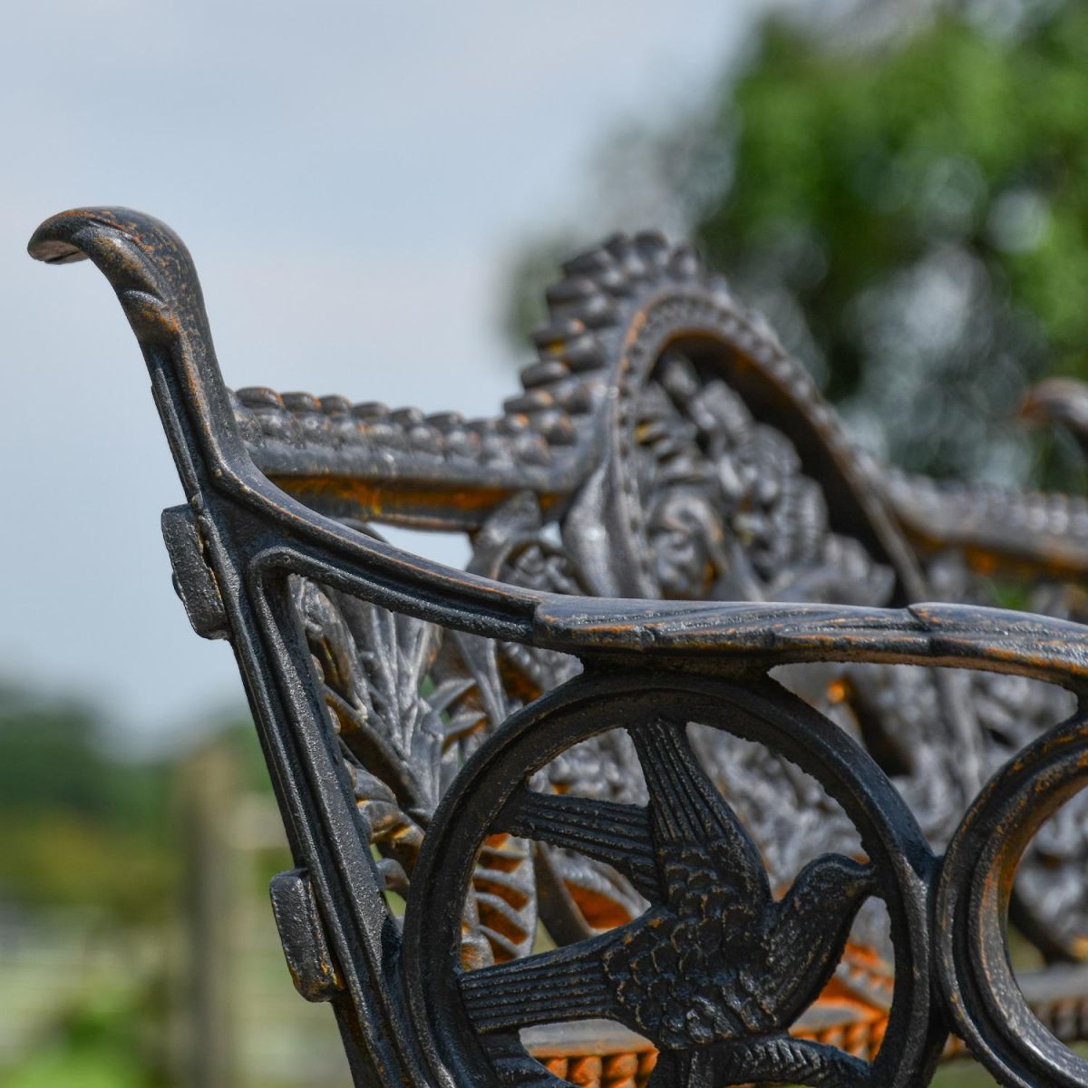 Close up of Aged Black Cast Iron Bench Frame