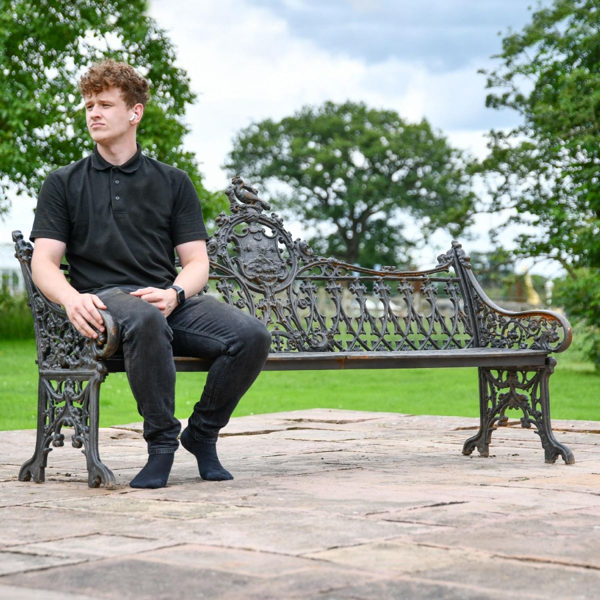 Aged Black Cast Iron Gothic Three Seater Garden Bench with Male for Scale Aged Black Cast Iron Gothic Three Seater Garden Bench with Male for Scale