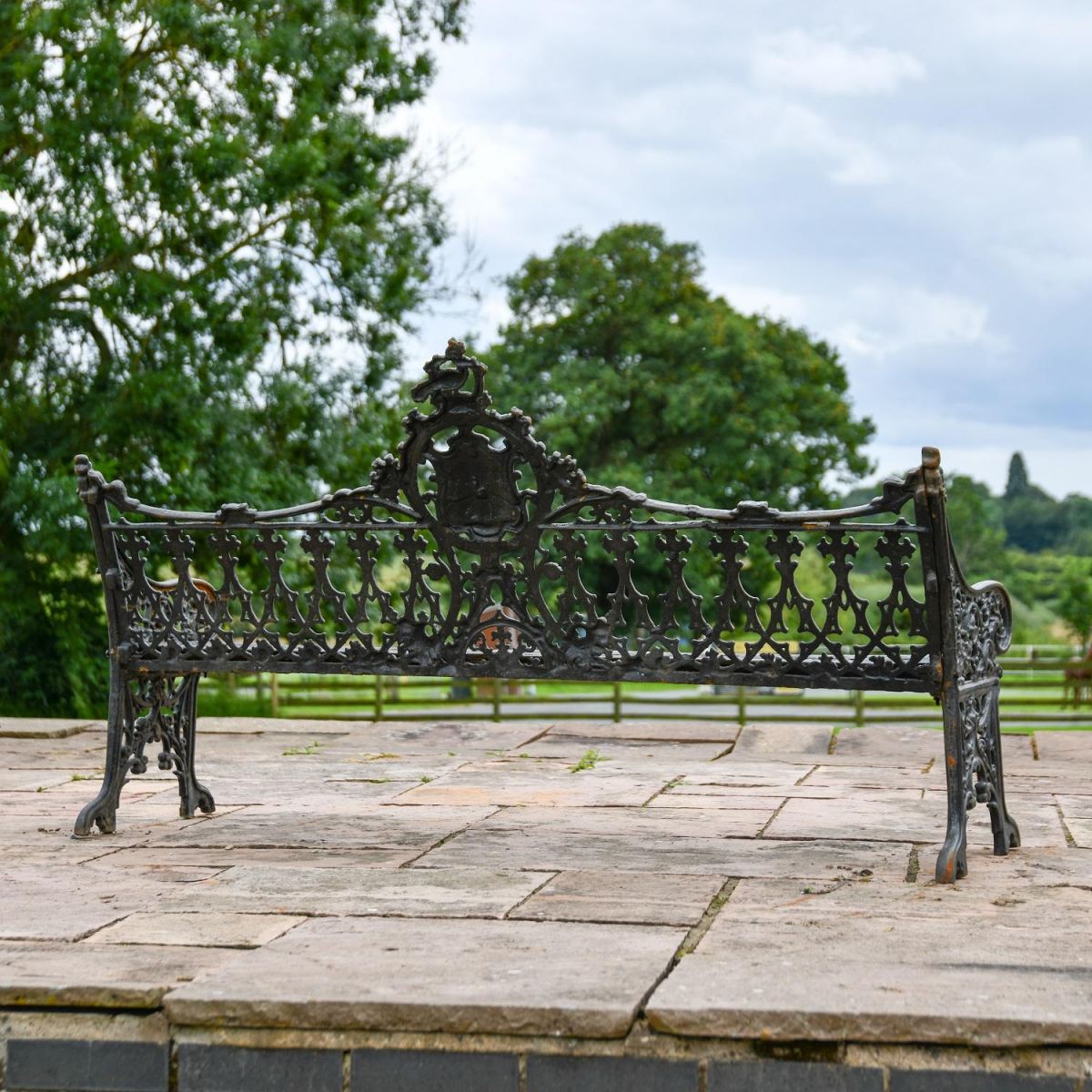 Rear view of Aged Black Cast Iron Gothic Three Seater Garden Bench Rear view of Aged Black Cast Iron Gothic Three Seater Garden Bench