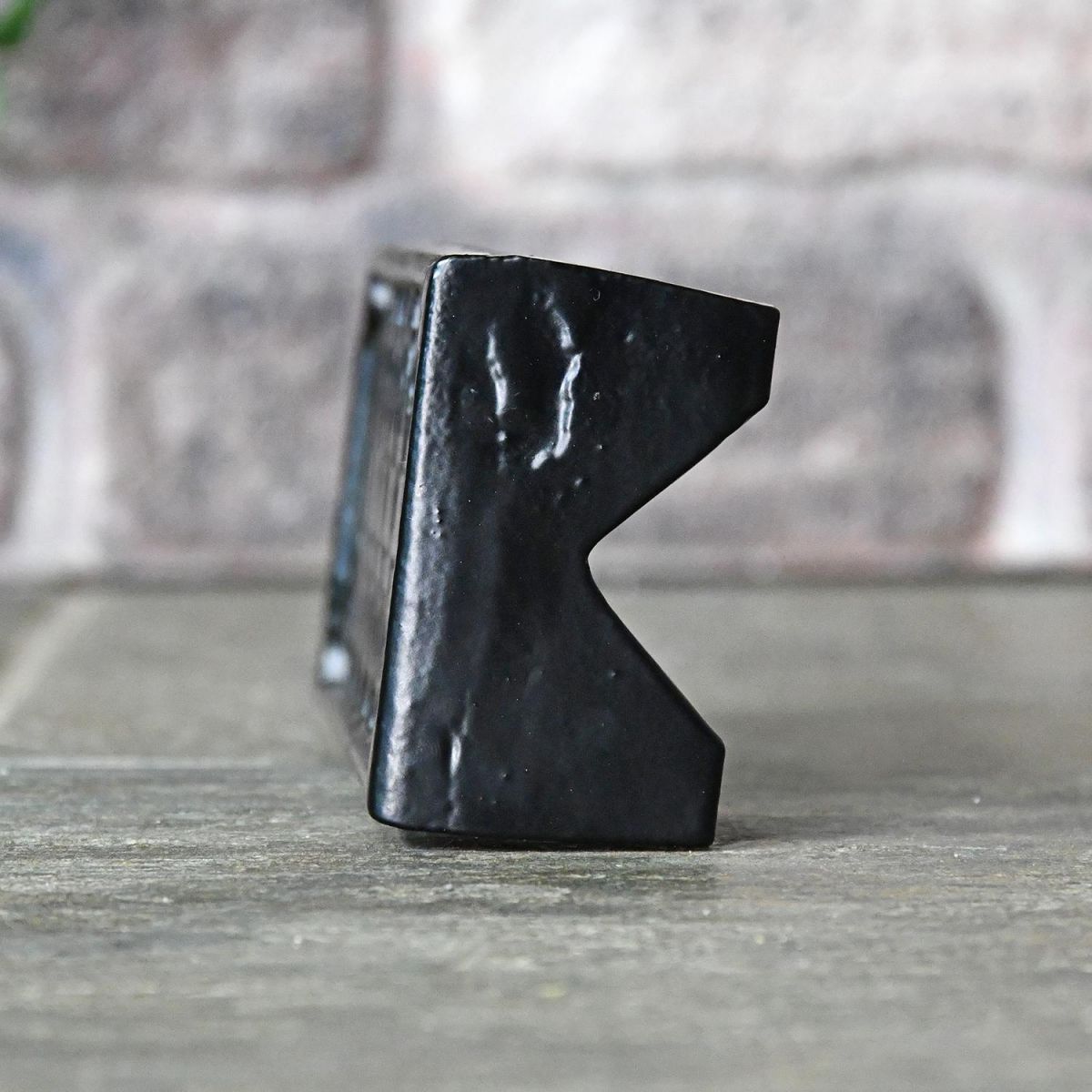 Side View of the Black Cast Iron "Keyhole Pattern" Air Brick 
