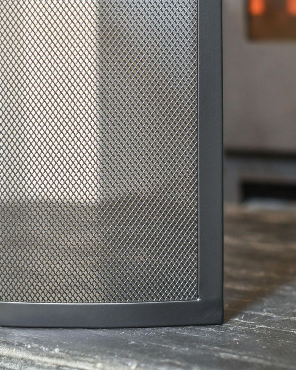 Close Up Of Black Contemporary Curved Single Panel Fire Guard Edges