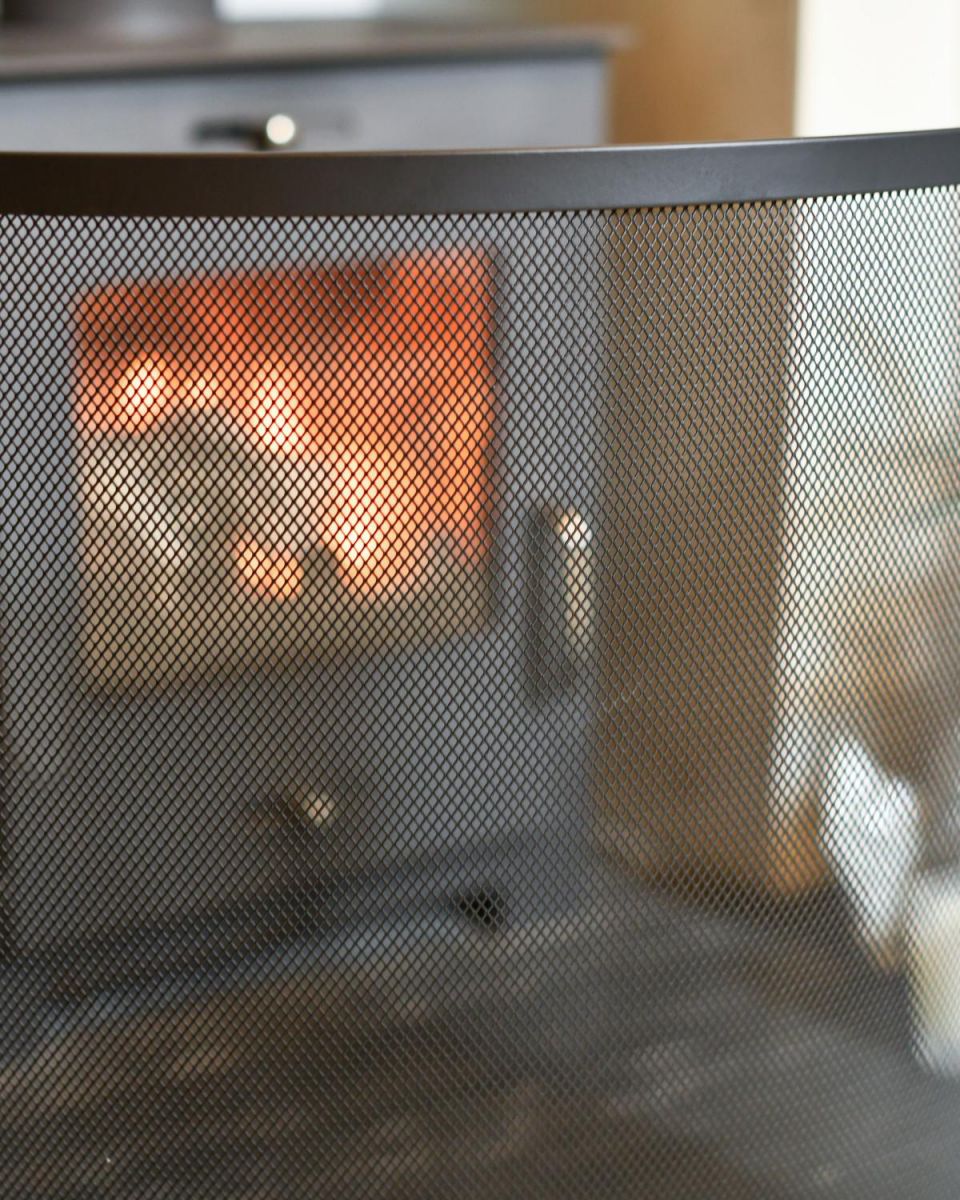 Close Up Of Black Contemporary Curved Single Panel Fire Guard Curved Frame