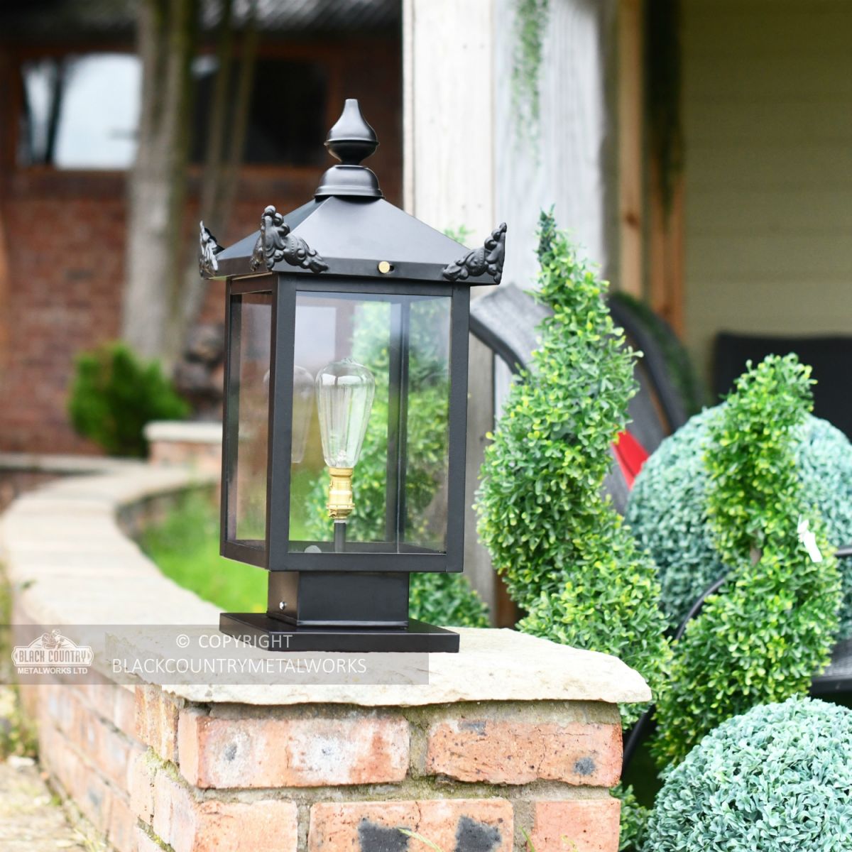 Black Contemporary Victorian Pillar Lantern On Stone Pillar