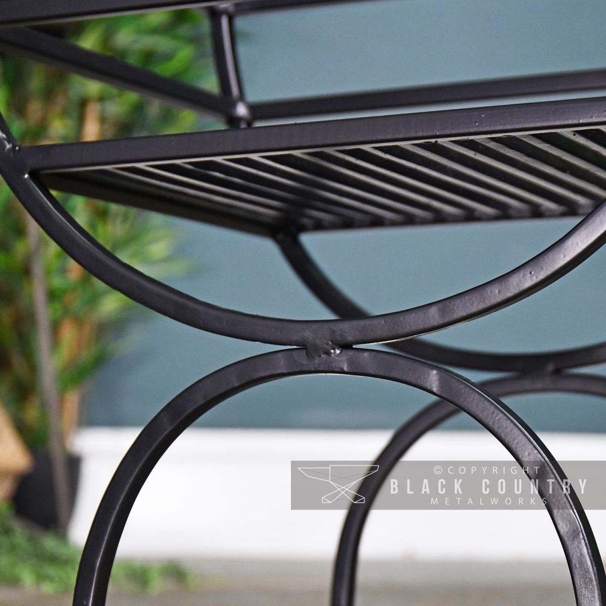 Close-up of the Black Finish on the Curved Log Holder Close-up of the Black Finish on the Curved Log Holder