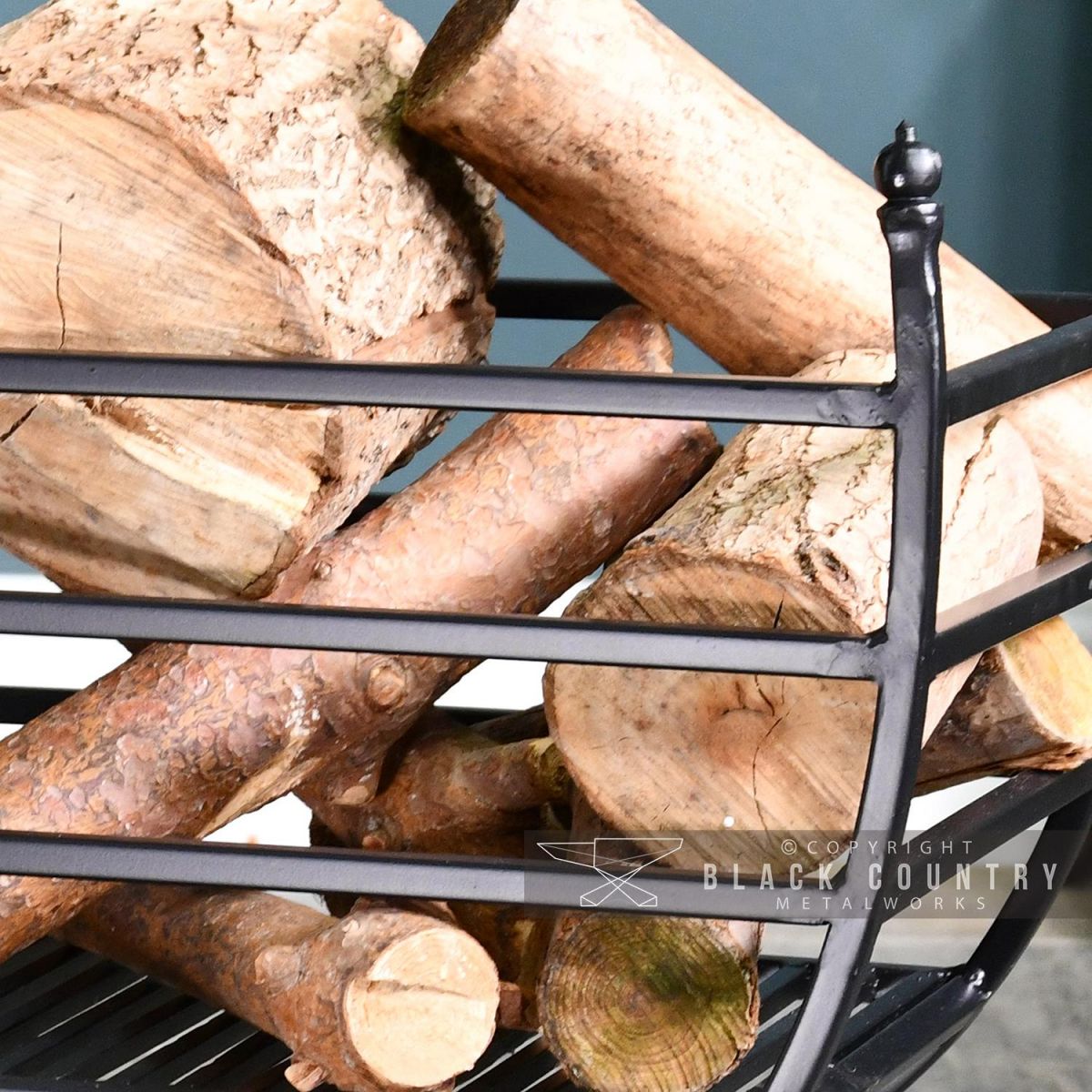 Close-up of the Finials on the End of the Log Holder Close-up of the Finials on the End of the Log Holder