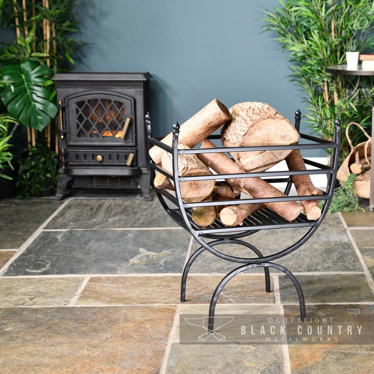 Curved Log Holder in Sutu Next to the Fire Place Curved Log Holder in Sutu Next to the Fire Place