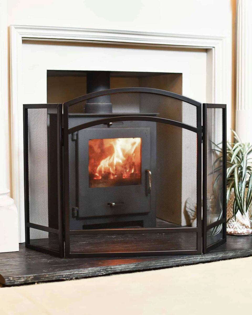 Black Curved Three Fold Fireguard in Situ Black Curved Three Fold Fireguard in Situ