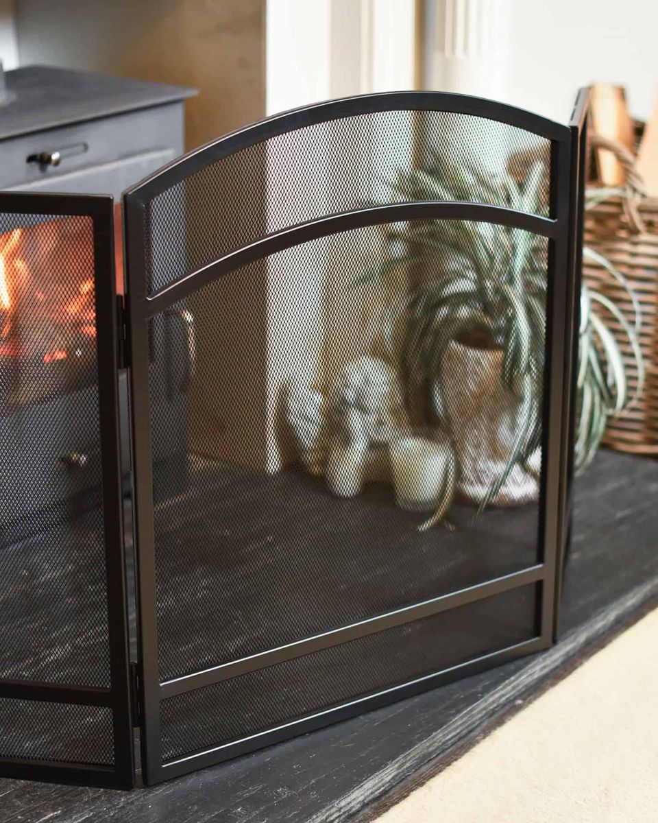 Close-Up of Black Curved Three Fold Fireguard Close-Up of Black Curved Three Fold Fireguard