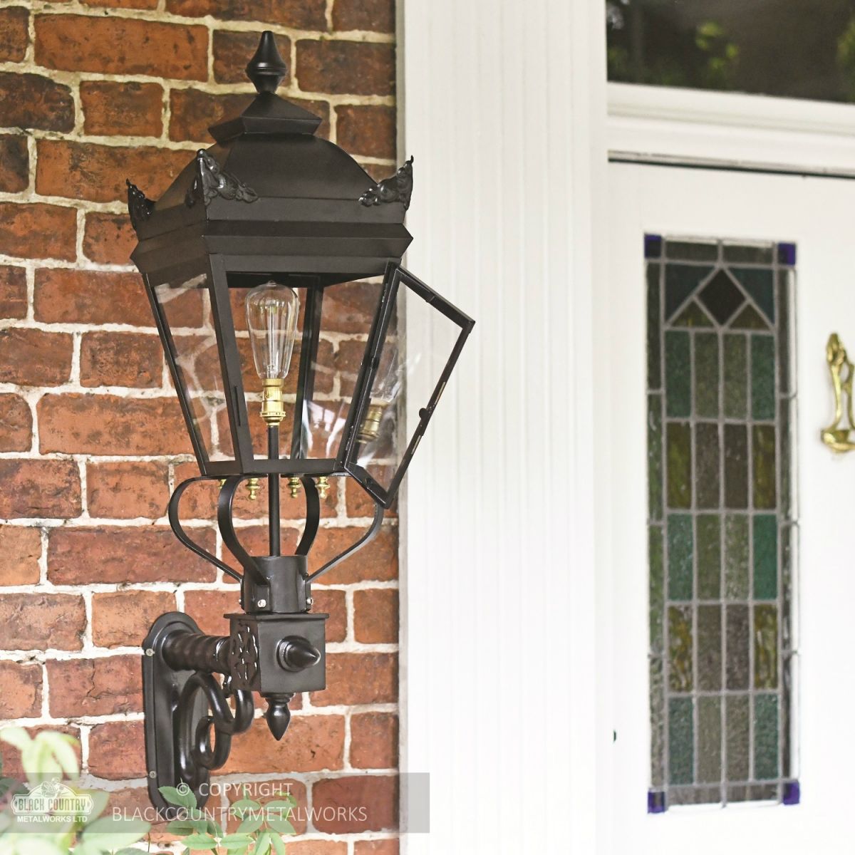 Black Deluxe Victorian Wall Lantern Installed By Front Door