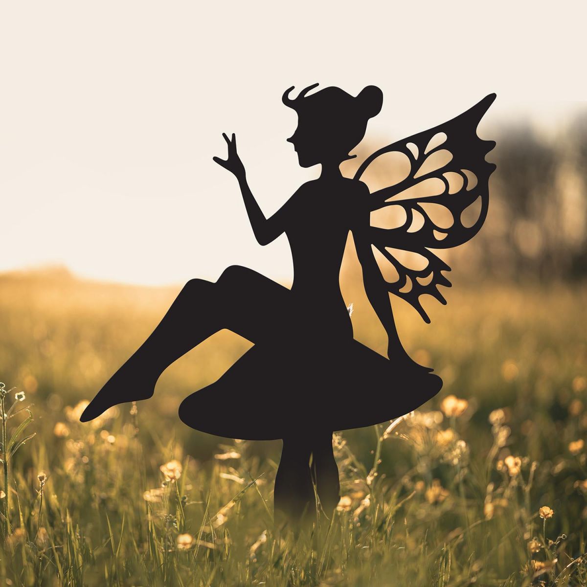 Flower Fairy Sitting on Toad Stool Silhouette in Use in a Field