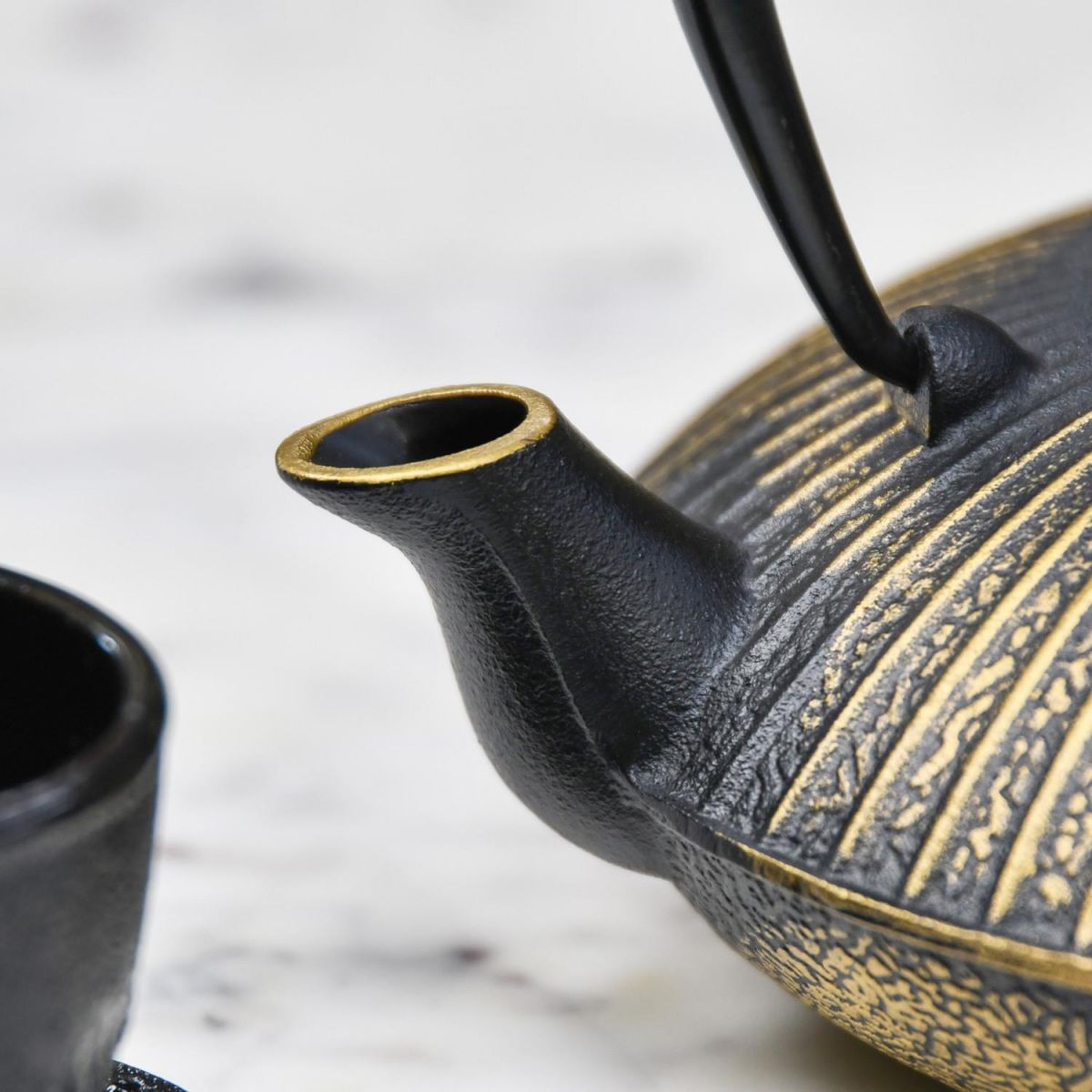 Close-Up of Spout on Cast Iron Japanese Teapot Close-Up of Spout on Cast Iron Japanese Teapot