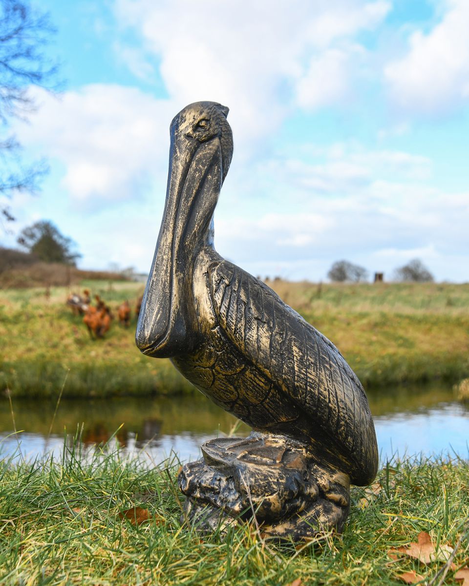 Brushed Gold Pelican Sculpture in Situ in the Garden