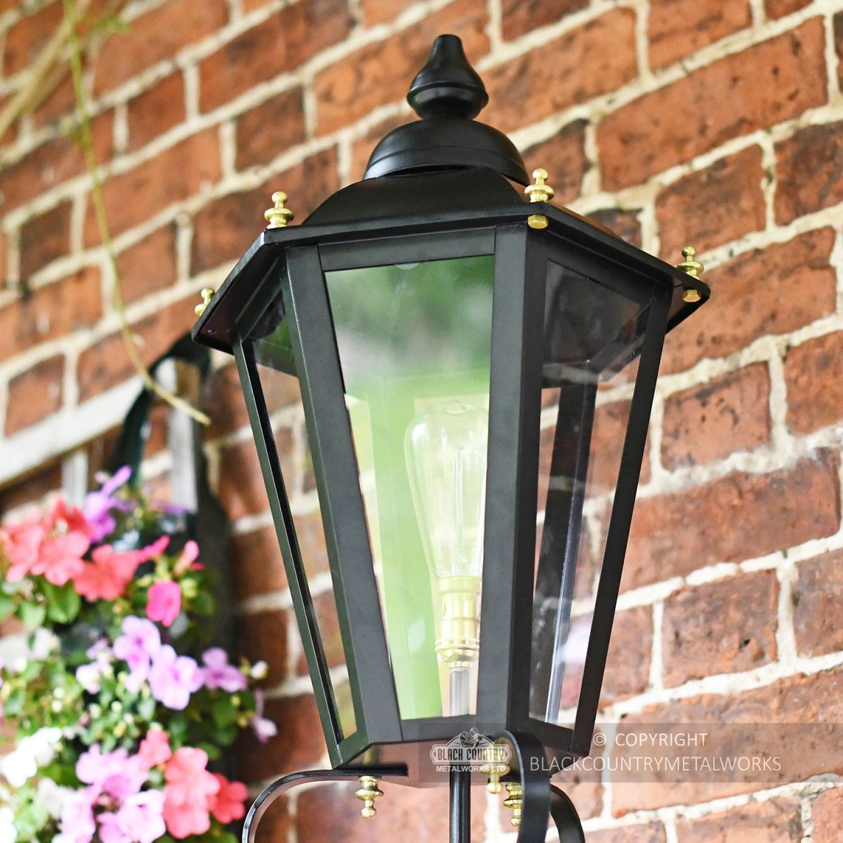 Black Hexagonal Lantern With Brass Detailing