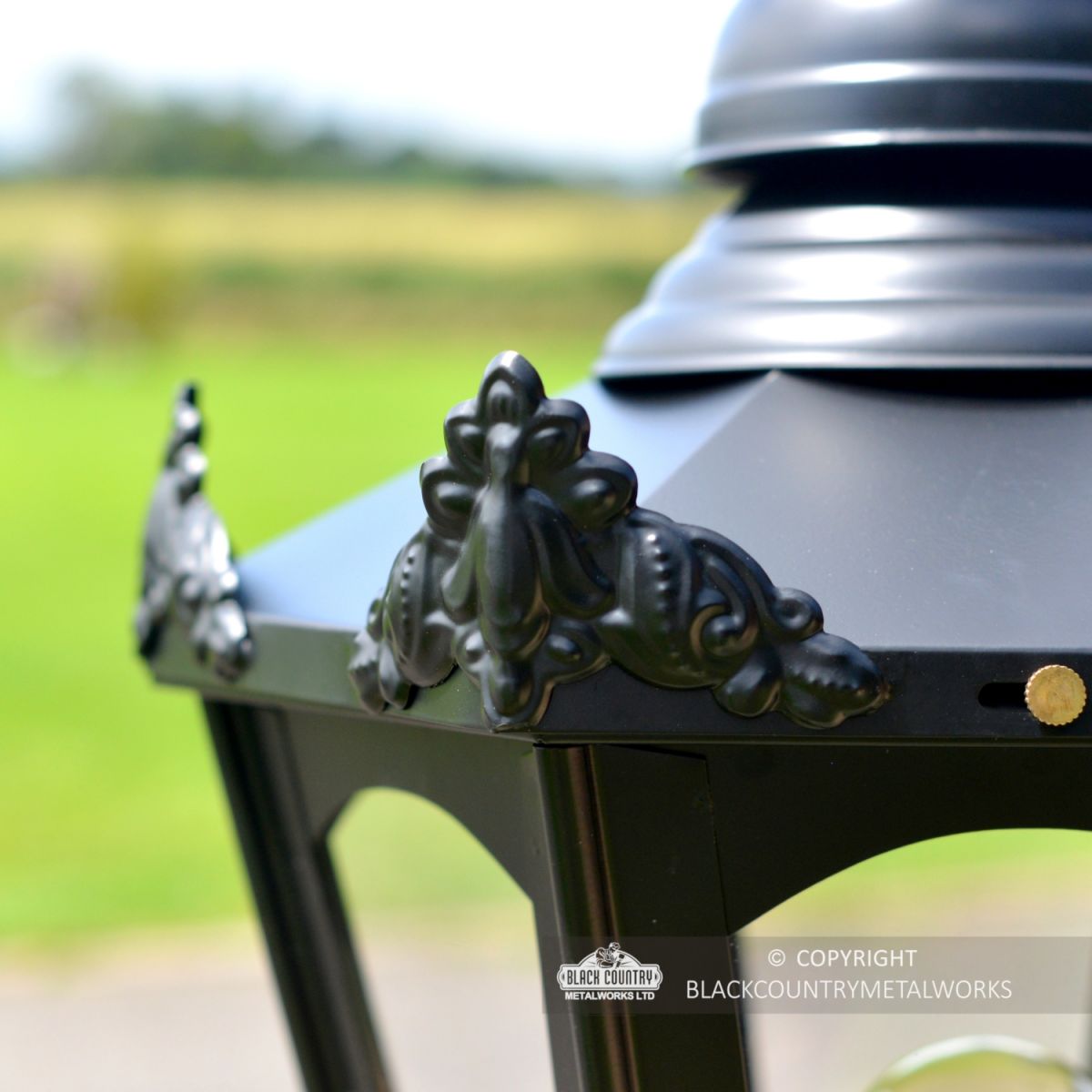 Close-up of the Decorative Ornate Wings on the Lantern"s Lid