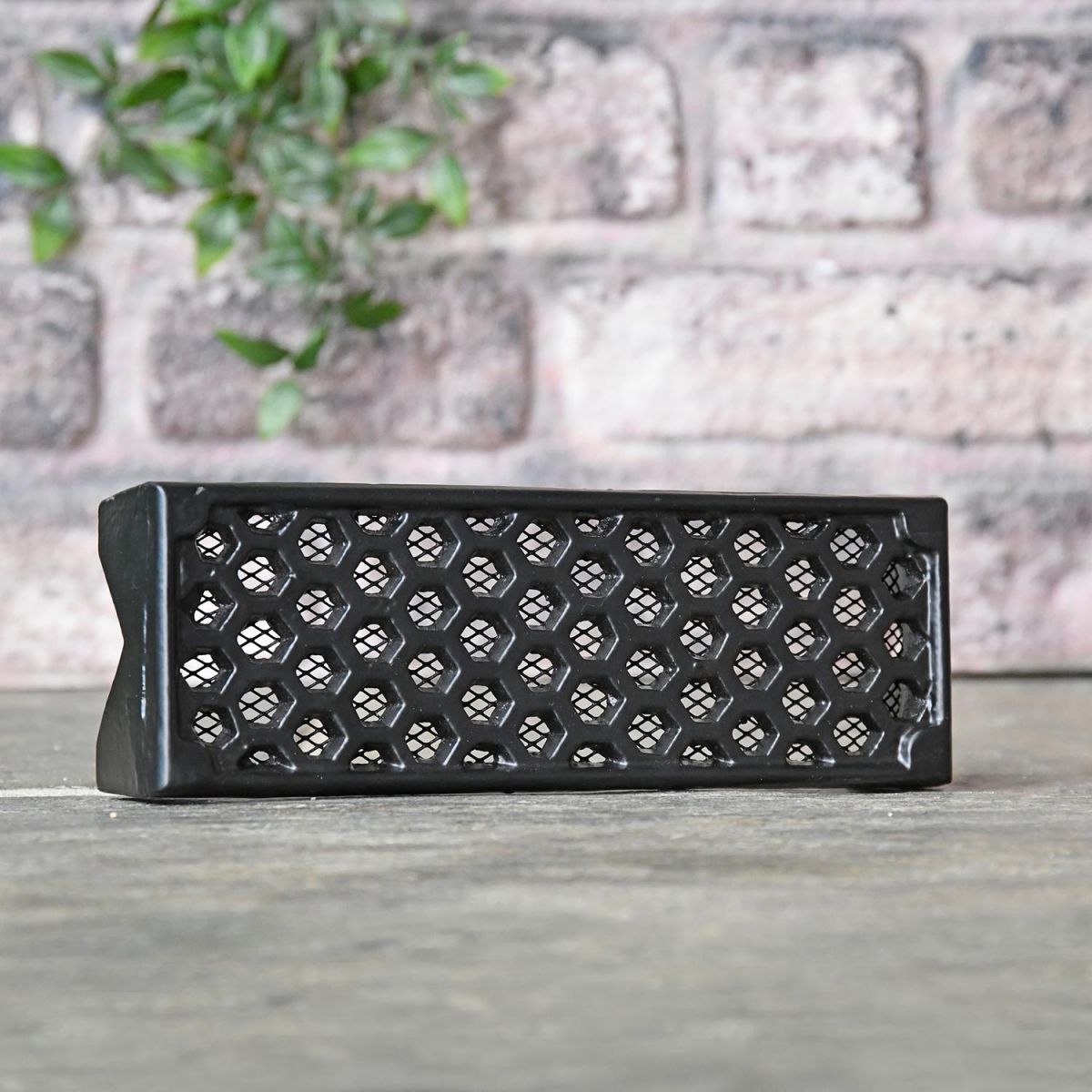 Side View of the Black "Honeycomb" Cast Iron Air Brick 