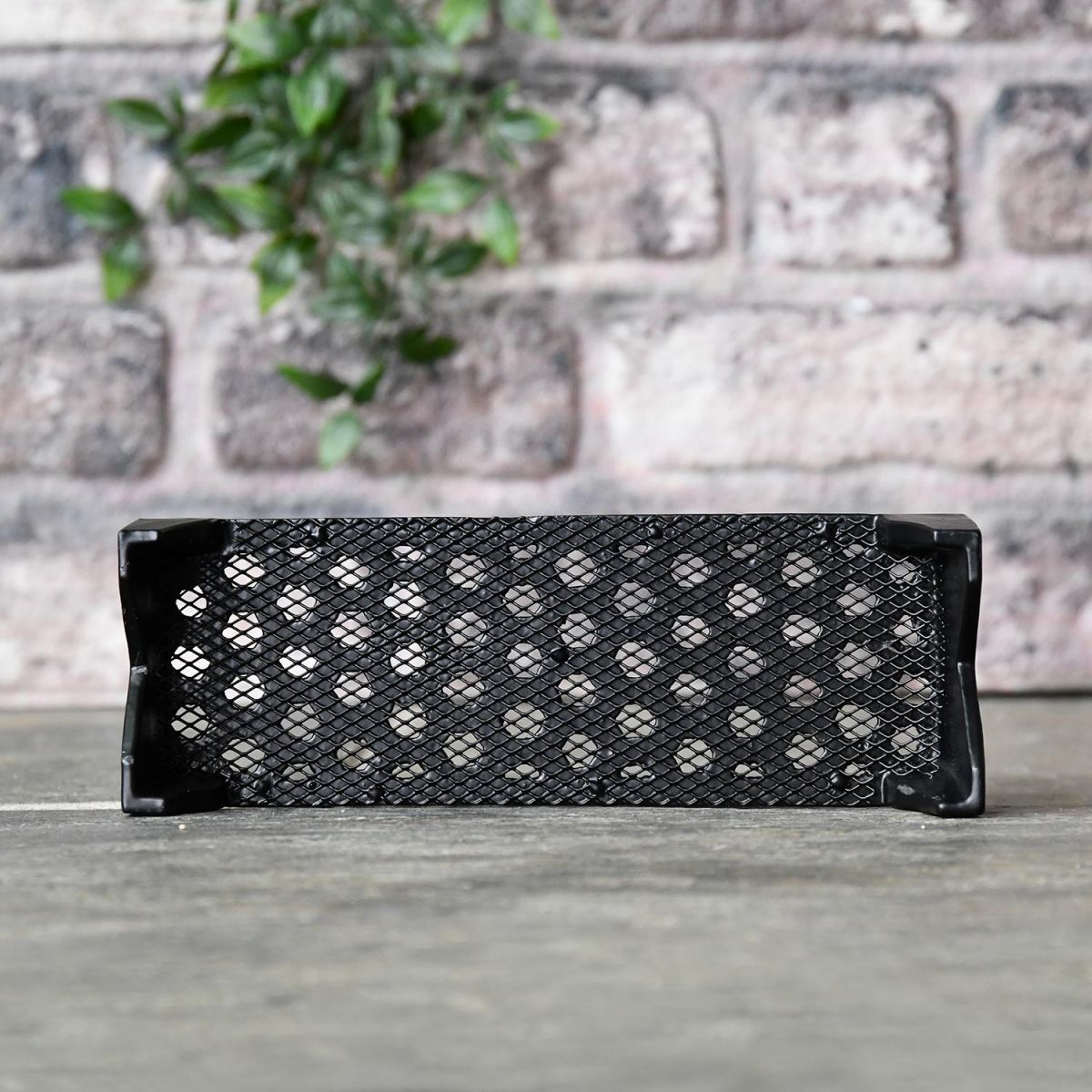 Black "Honeycomb" Cast Iron Air Brick in the Home
