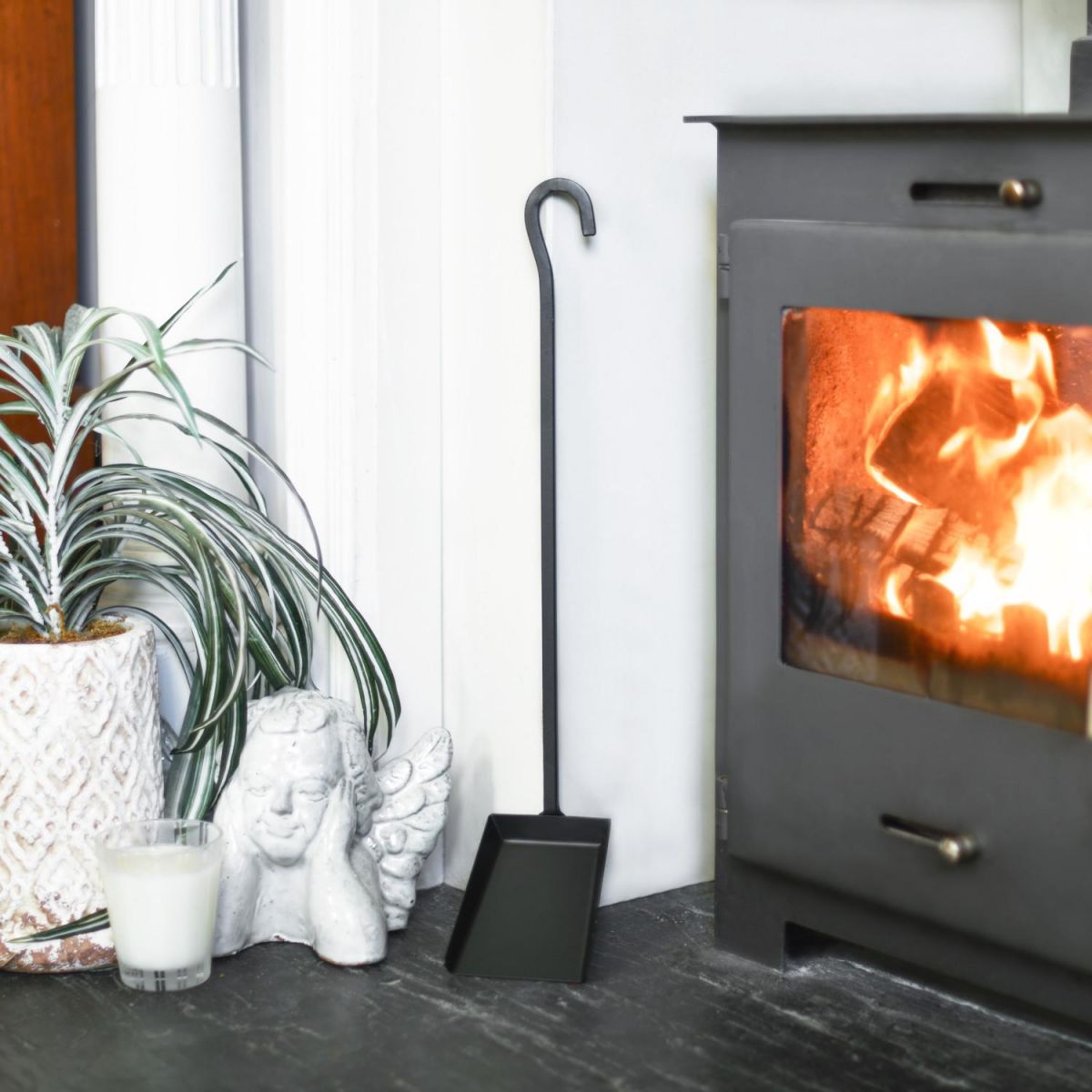 Black Hooked Fireside Shovel In A Fireside Setting