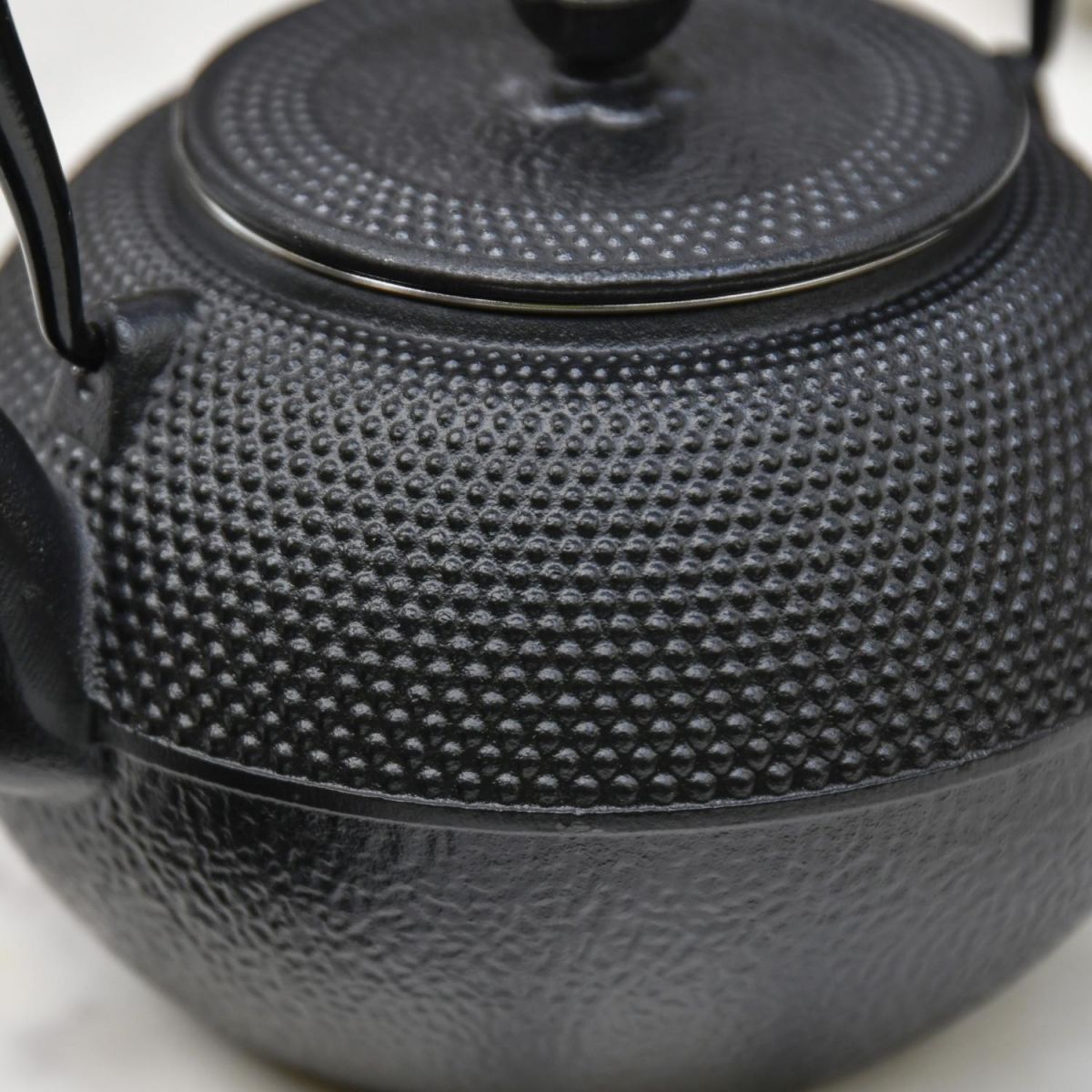 Close-Up of Japanese Dotted Design on Cast Iron Teapot