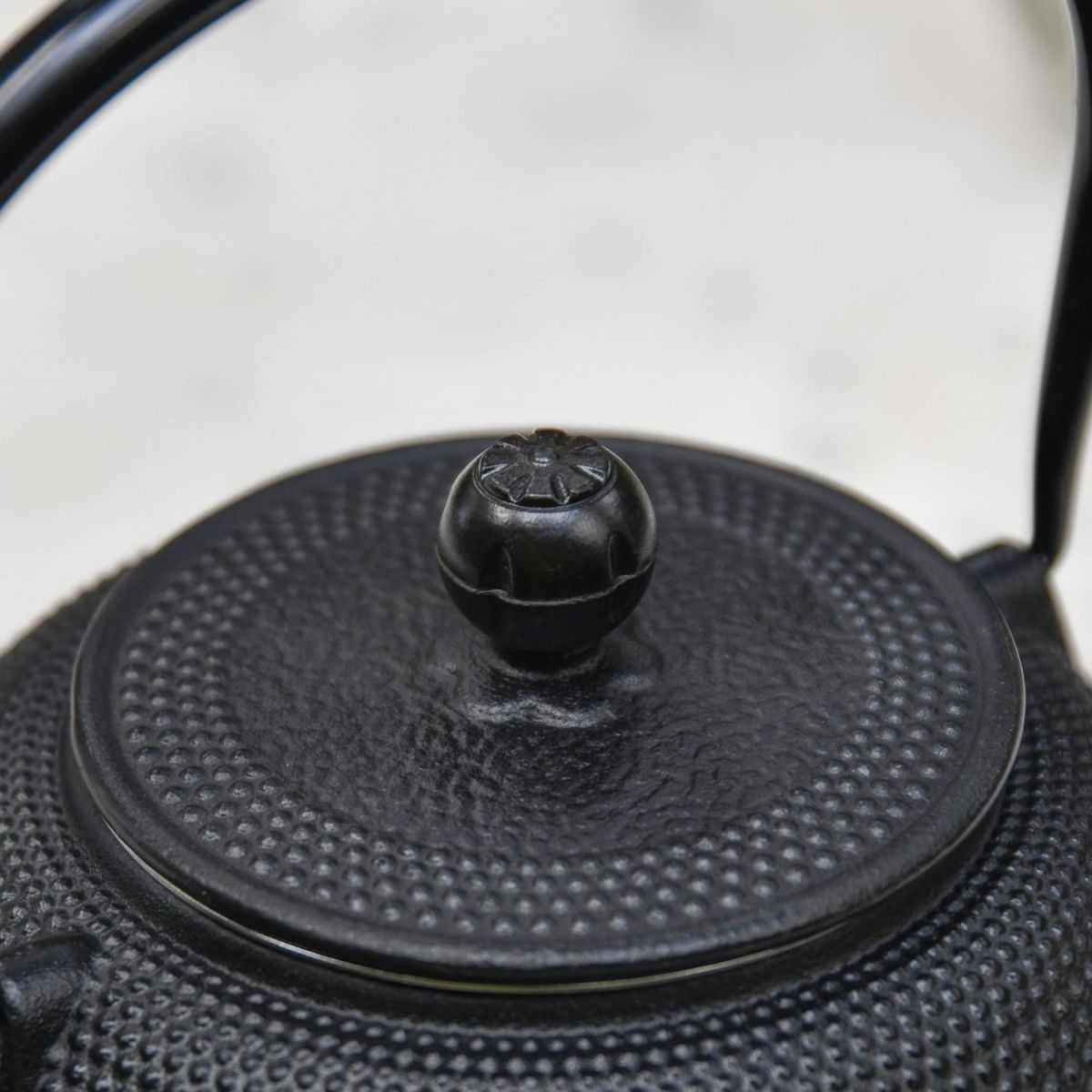 Close-Up of Closed Lid on Black "Kyusu" Cast Iron Japanese Teapot with Handle