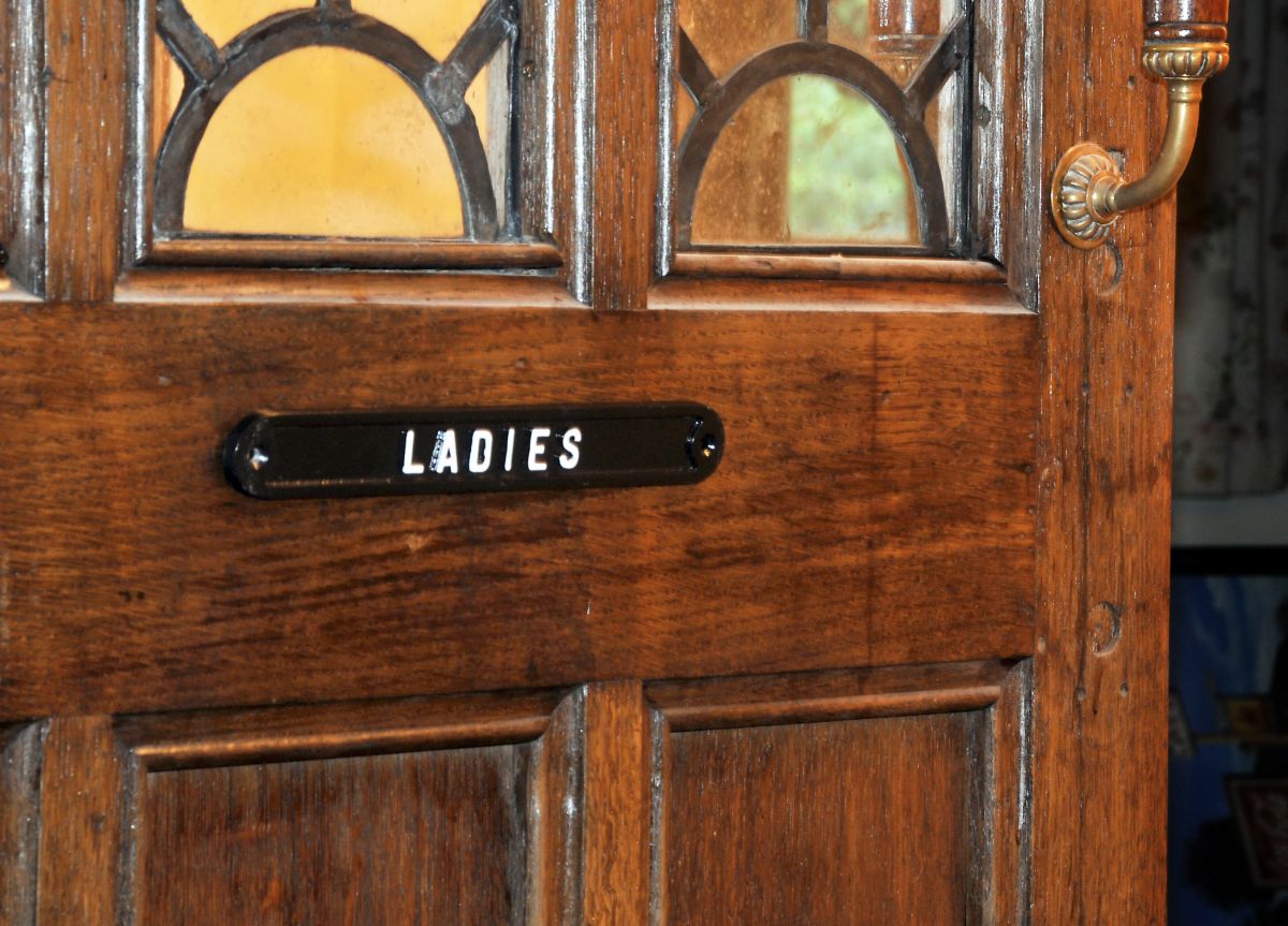 Ladies cast aluminum bathroom sign Ladies cast aluminum bathroom sign