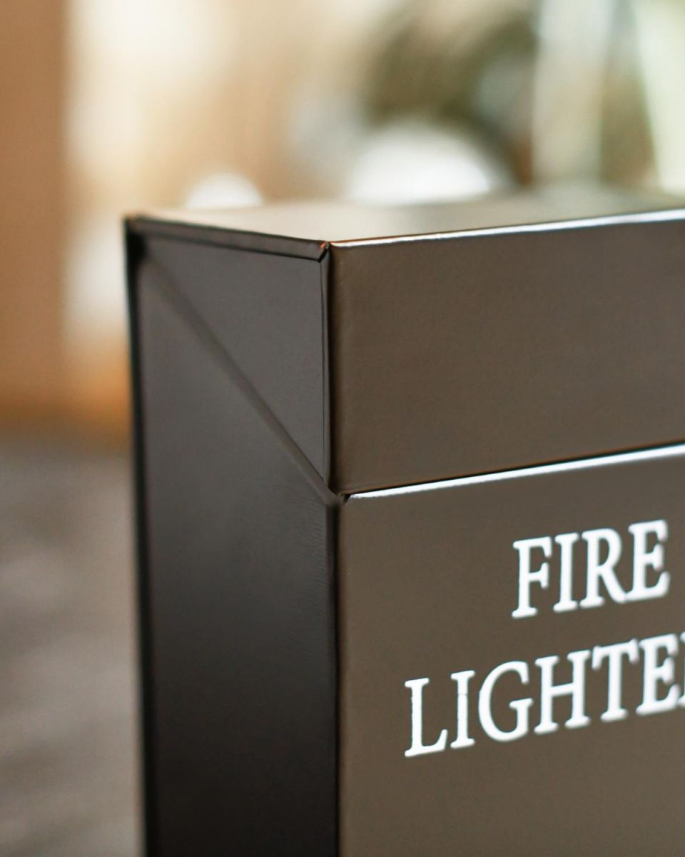 Close Up Of Black Metal "Fire Lighters" Holder Close Up Of Black Metal "Fire Lighters" Holder