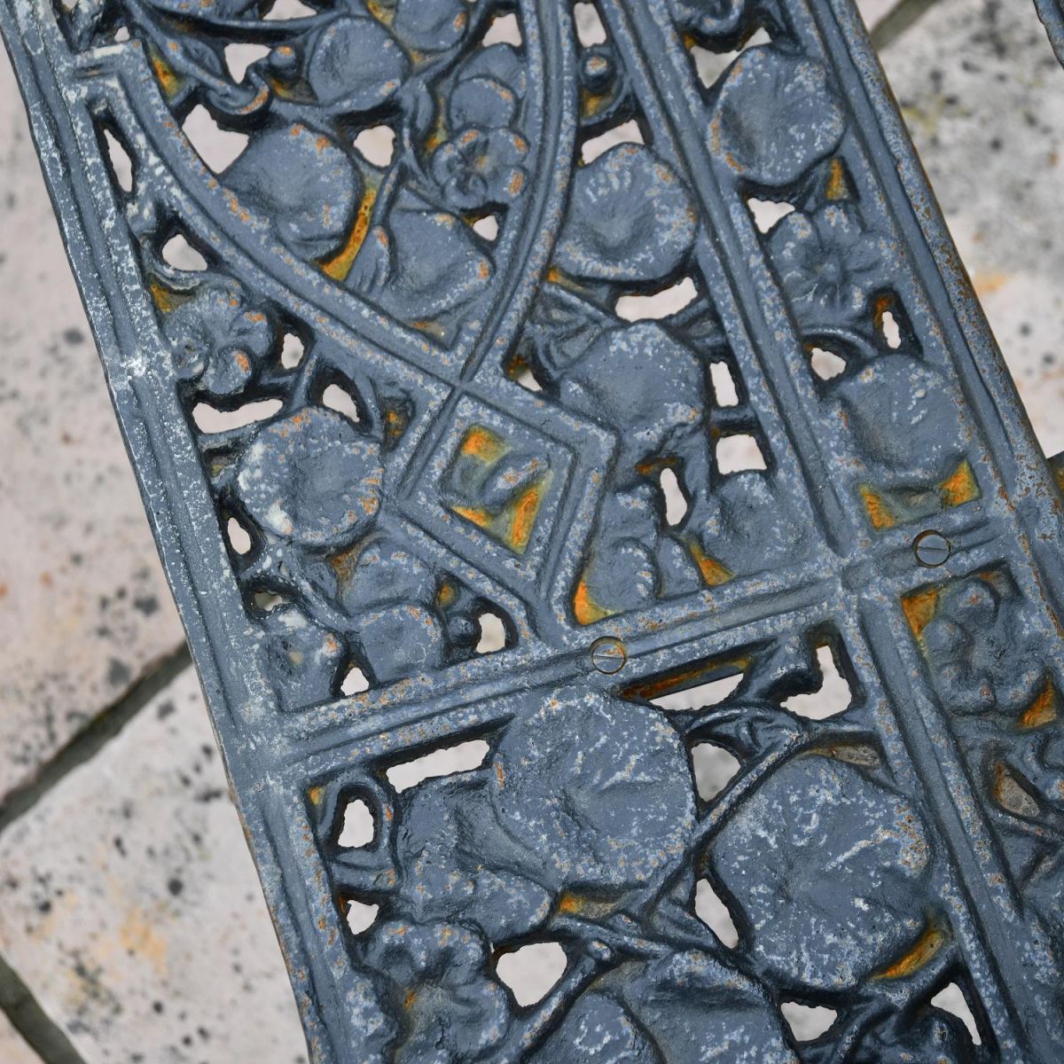 Close up of leaf design on cast iron bench Close up of leaf design on cast iron bench