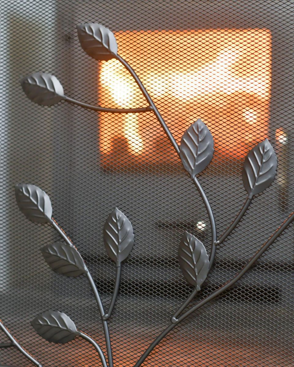 Close Up Of Black "Overgrowth" Three Fold Fire Guard Detailing Close Up Of Black "Overgrowth" Three Fold Fire Guard Detailing