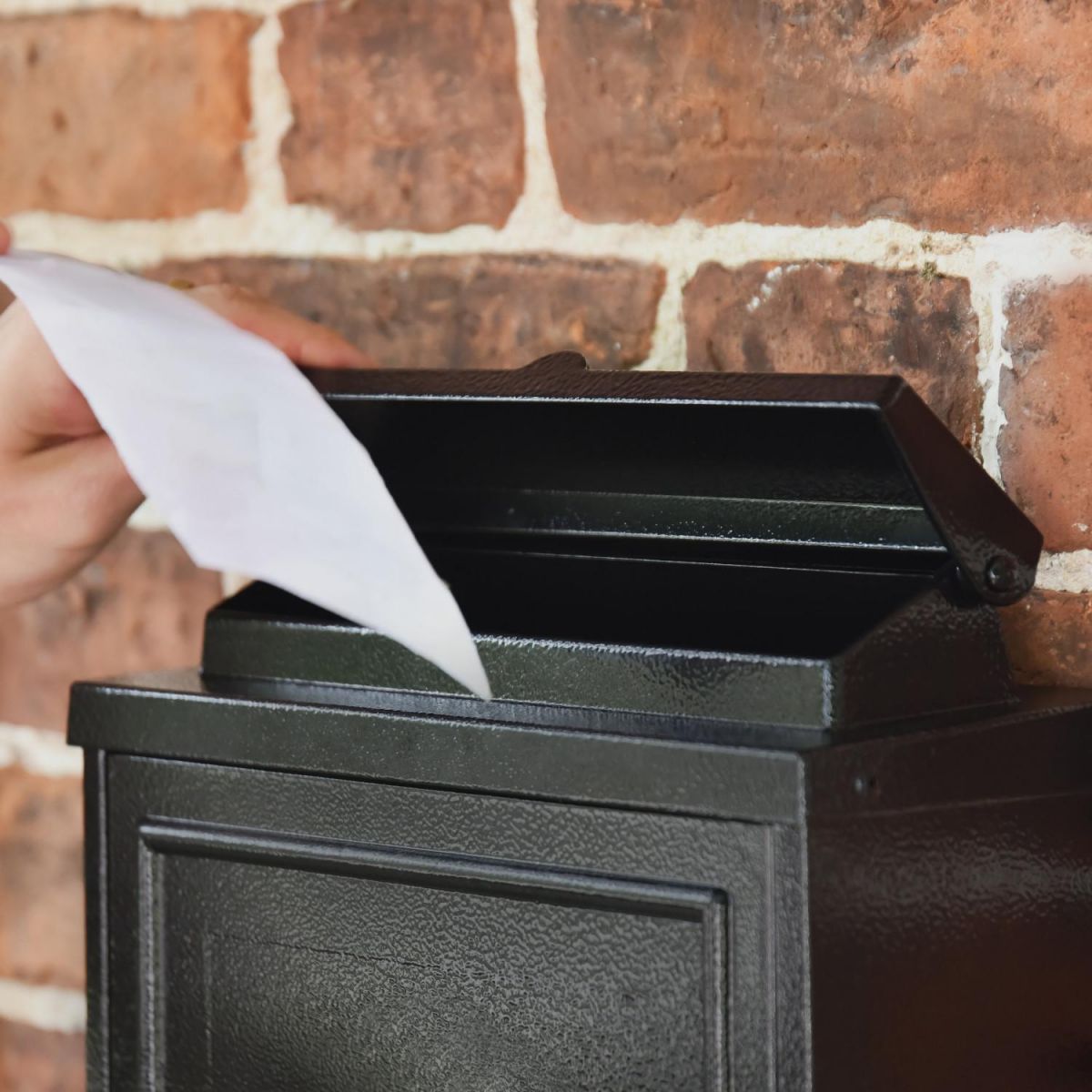 Top Opening Letter Flap on the Black Oxford Wall Mounted Post Box with Silver Text