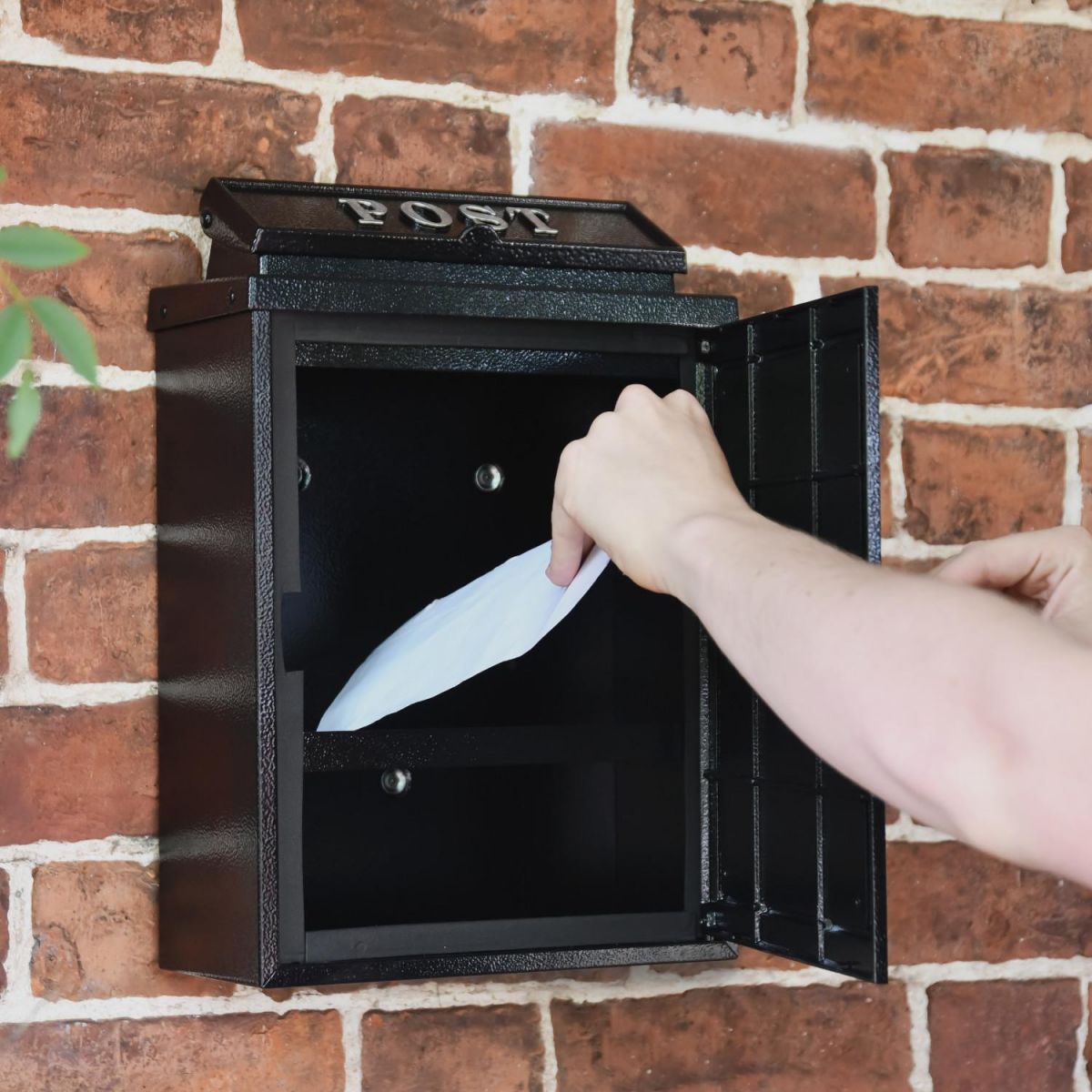 Front Opening Door on the Black Oxford Wall Mounted Post Box with Silver Text