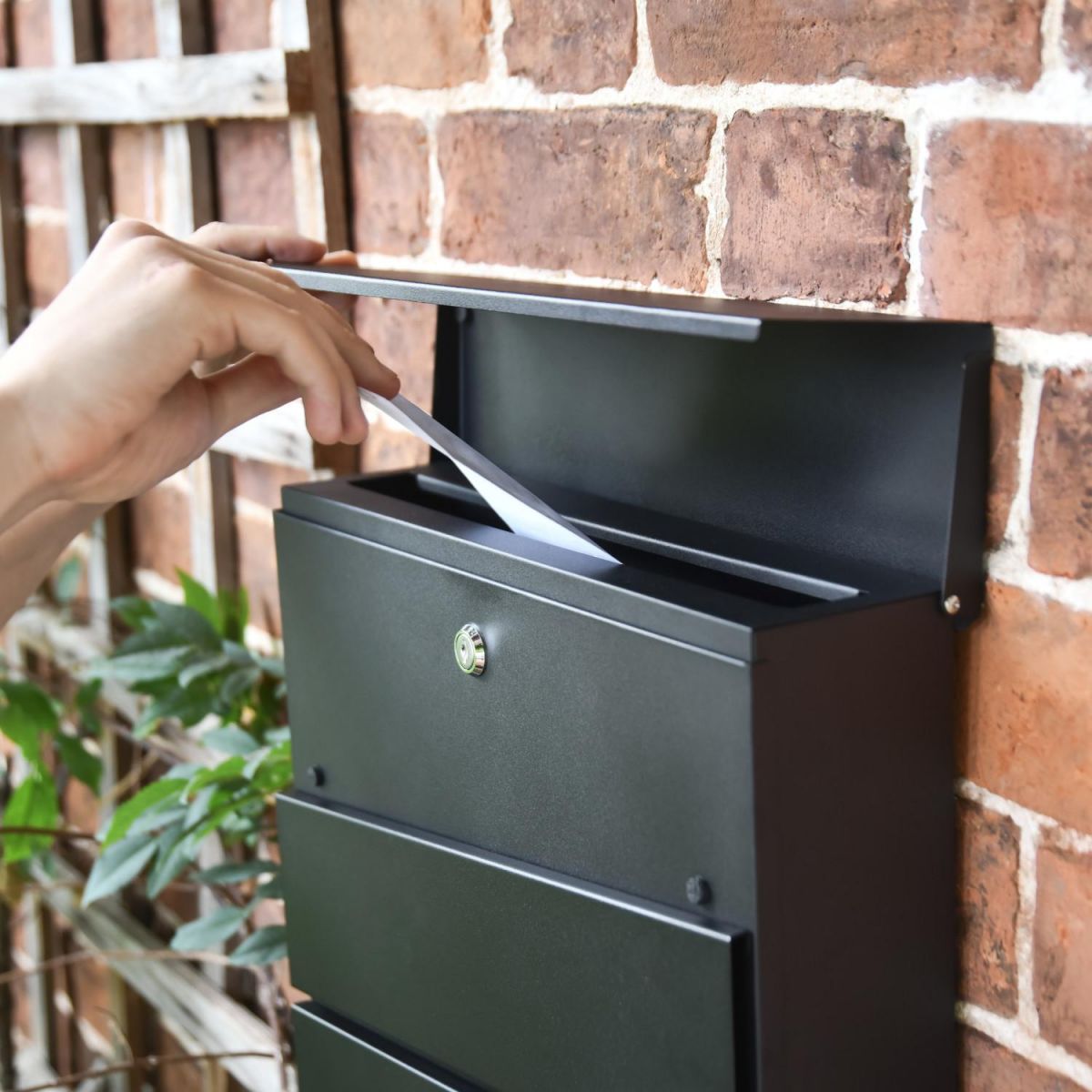 Letter Flap in Use on Black "Park View" Wall Mounted Post Box & Newspaper Holder