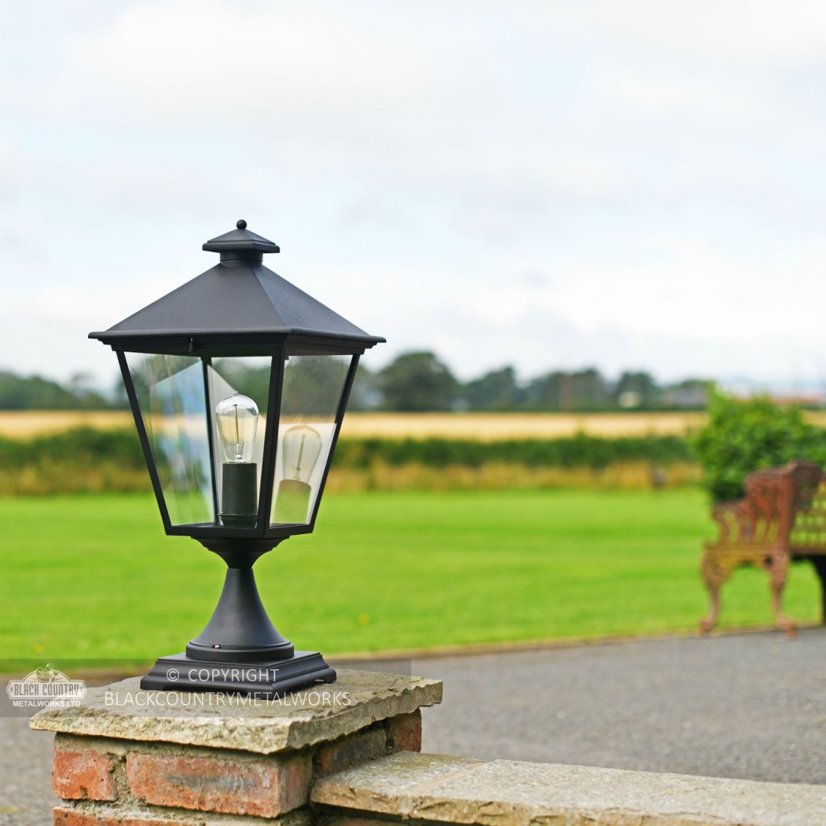 Black Simplistic Victorian Pillar Light On Stone Entrance Post Black Simplistic Victorian Pillar Light On Stone Entrance Post