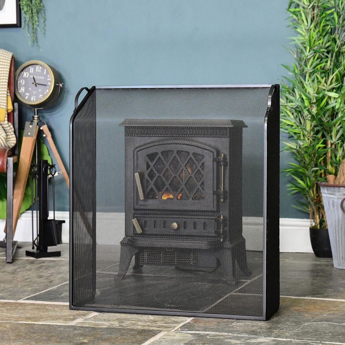 Black Sloping Fire Guard in Situ in Front of the Fire Place