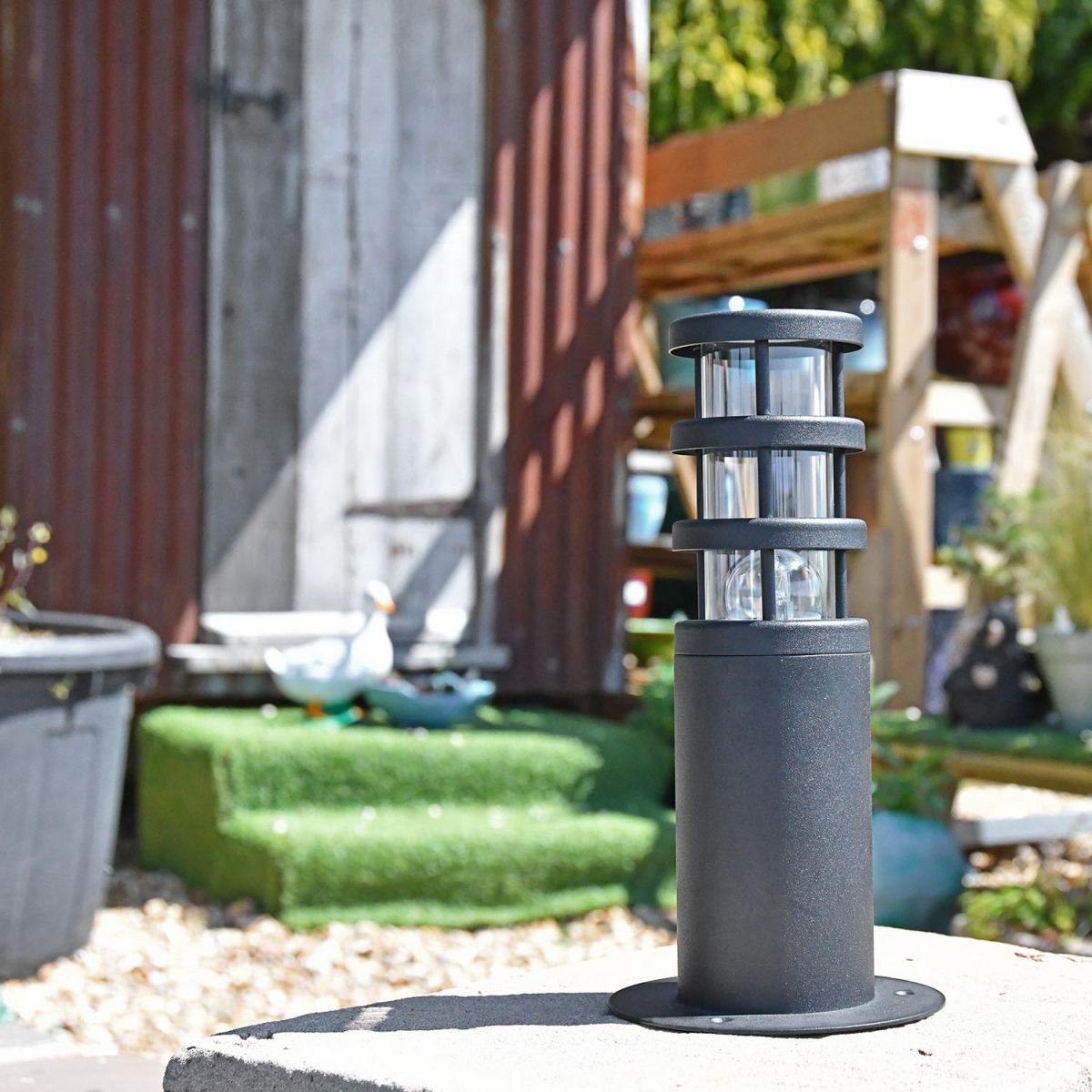 Black Stainless Steel Contemporary Pedestal Light in Situ