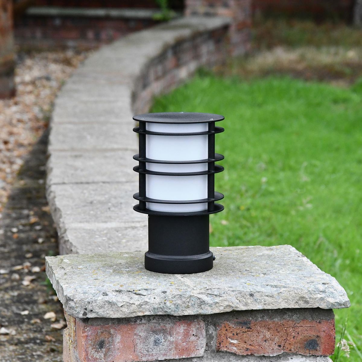 Black Steel Low Level Bollard Light in Situ on Brick Pillar Black Steel Low Level Bollard Light in Situ on Brick Pillar