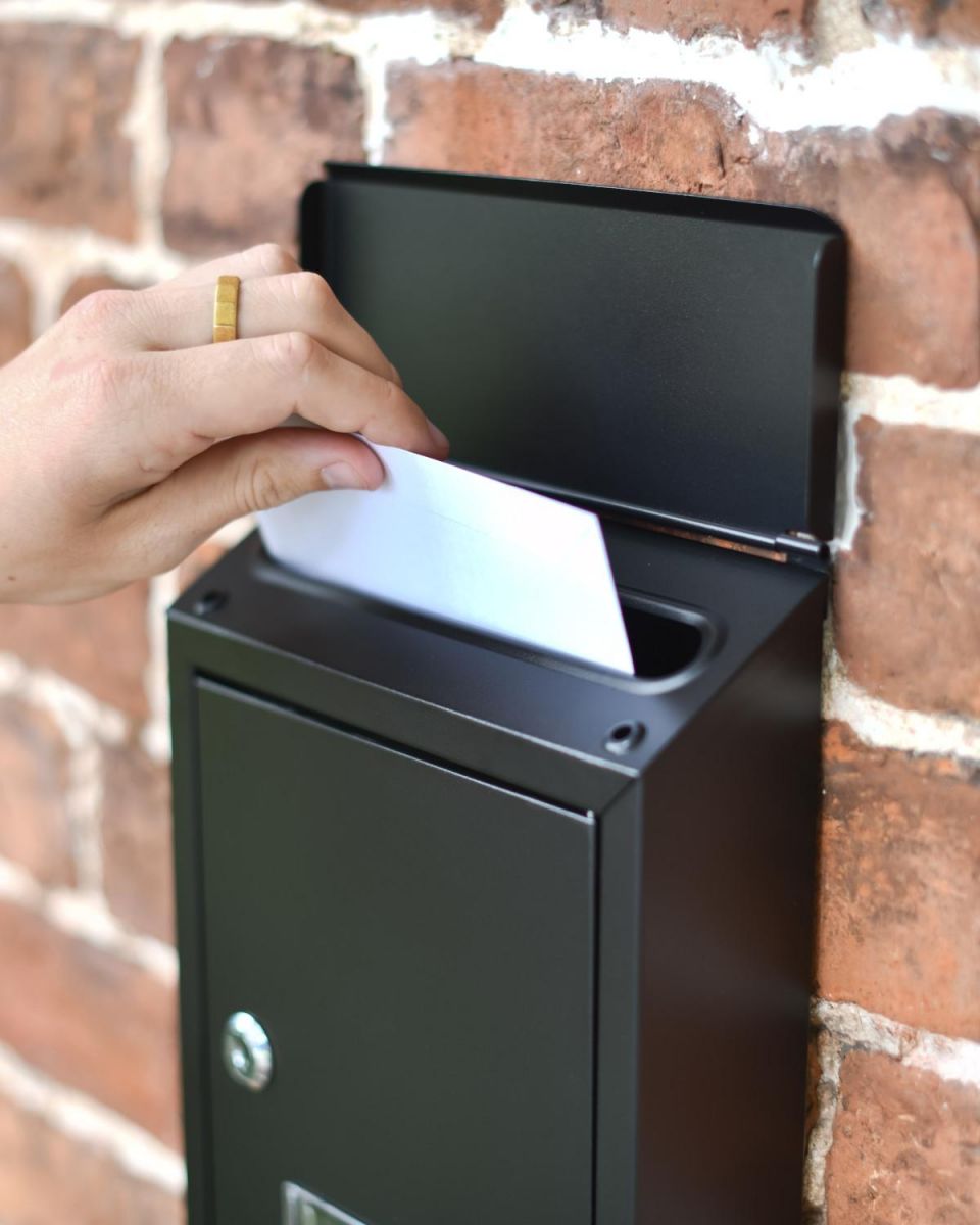 Close-up of the Letter Insert on the Wall Mounted Post Box Close-up of the Letter Insert on the Wall Mounted Post Box