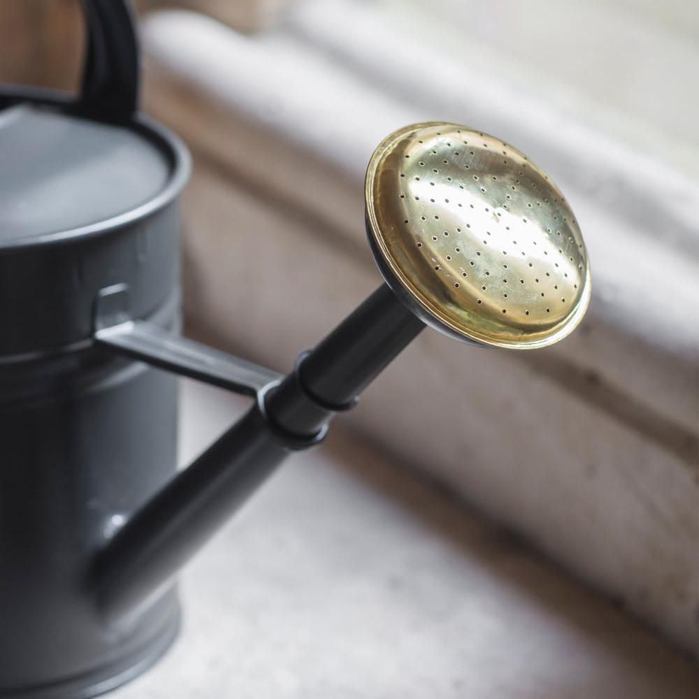 Close-up of the Brass on the End of the Traditional Watering Can in Situ