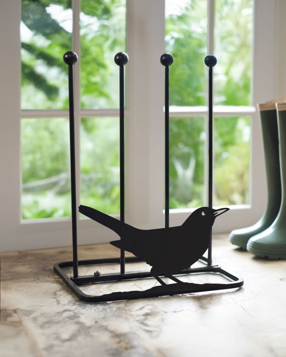 Blackbird boot rack in front of patio doors Blackbird boot rack in front of patio doors