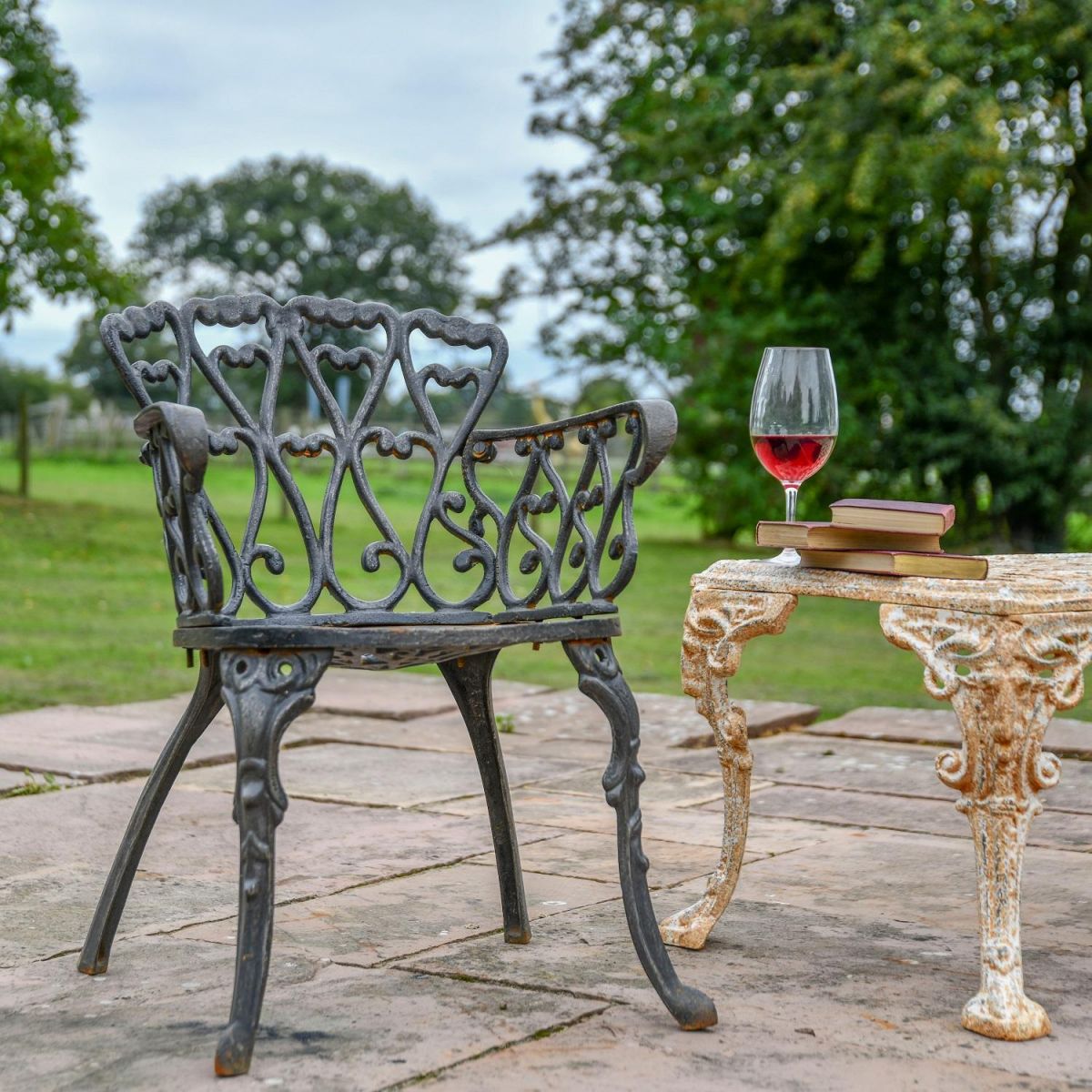 Aged Black Cast Iron Heart Scrolled Garden Chair Aged Black Cast Iron Heart Scrolled Garden Chair