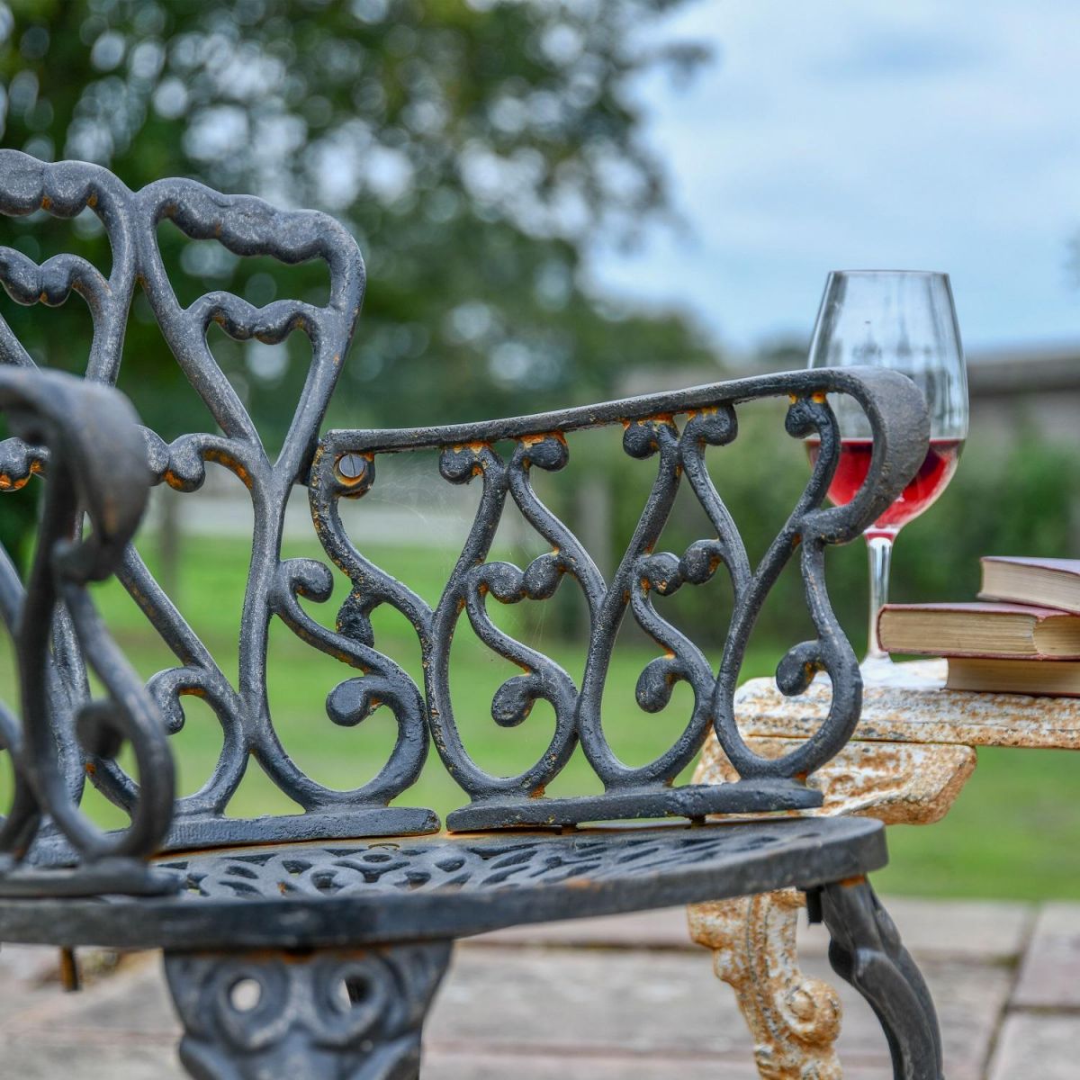 Close up of Aged Black Heart Scrolled Chair Close up of Aged Black Heart Scrolled Chair