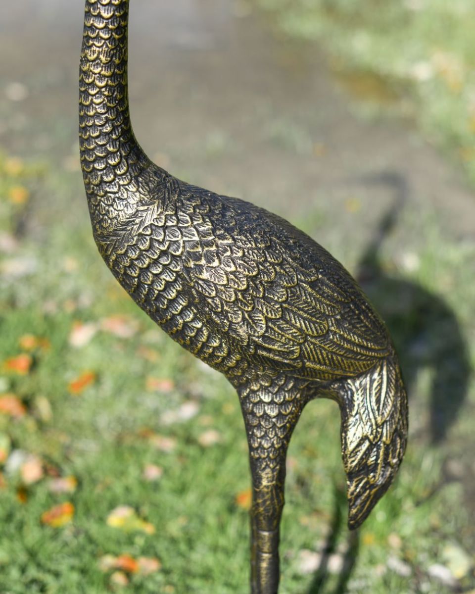 Close up of freestanding crane sculpture"s wing