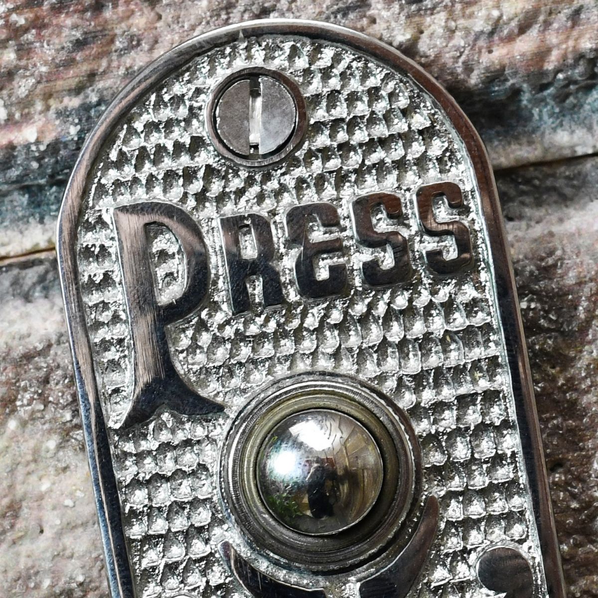 Detailed image of wording "press"