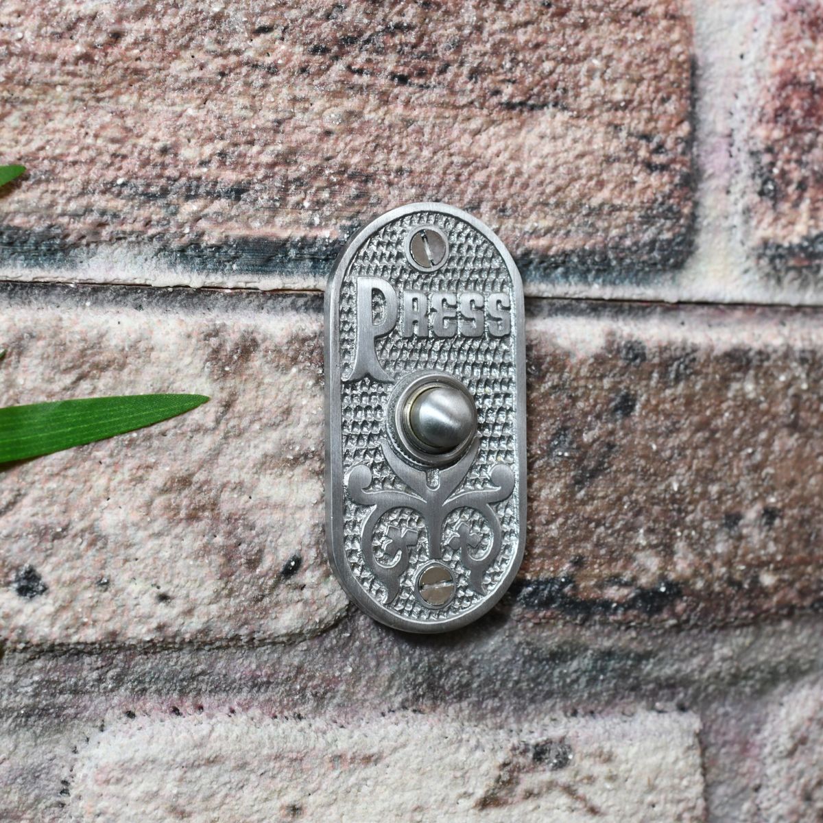 Vintage door push button finished in satin chrome