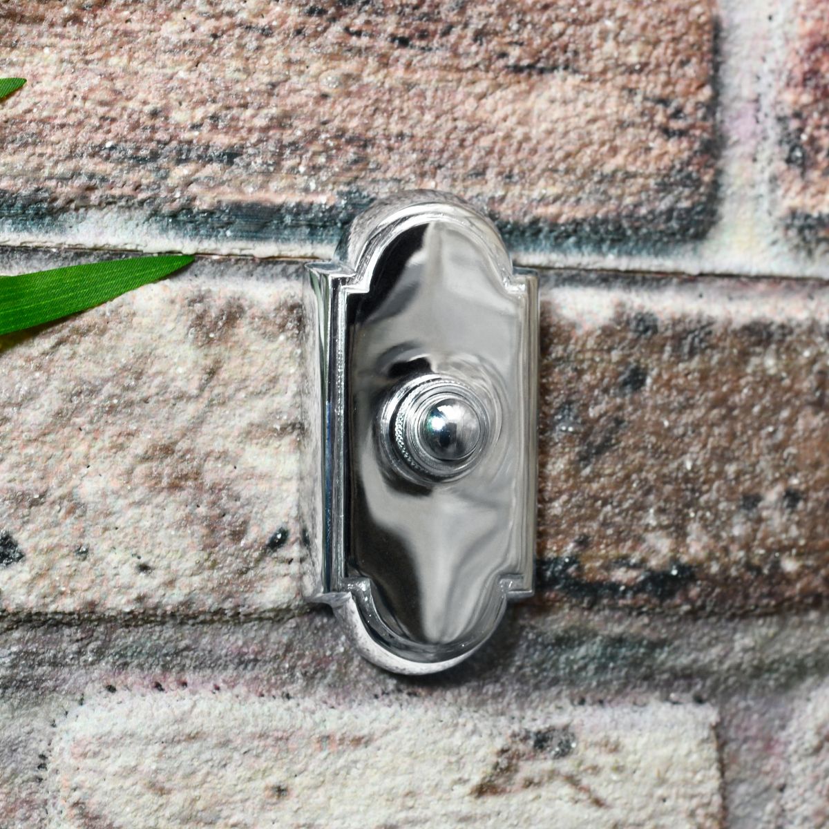 Rectangle arched door buzzer finished in bright chrome