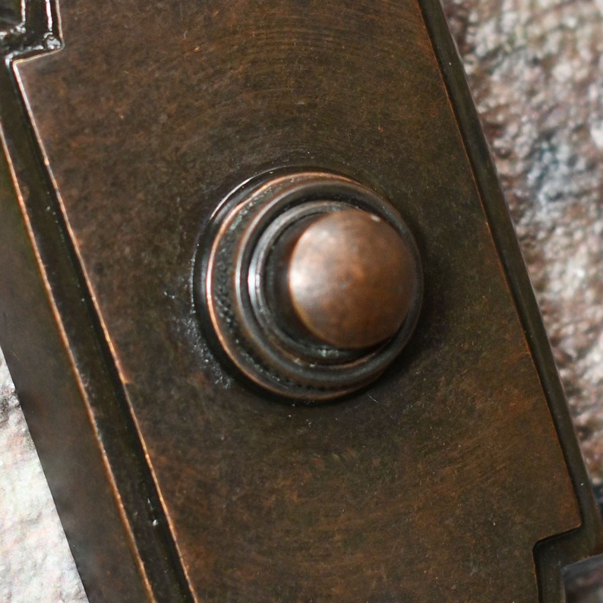 Detailed image of push button for door bell chime