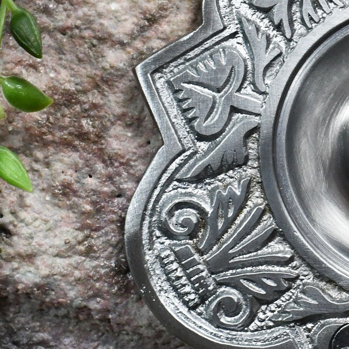 Close up of satin chrome door bell