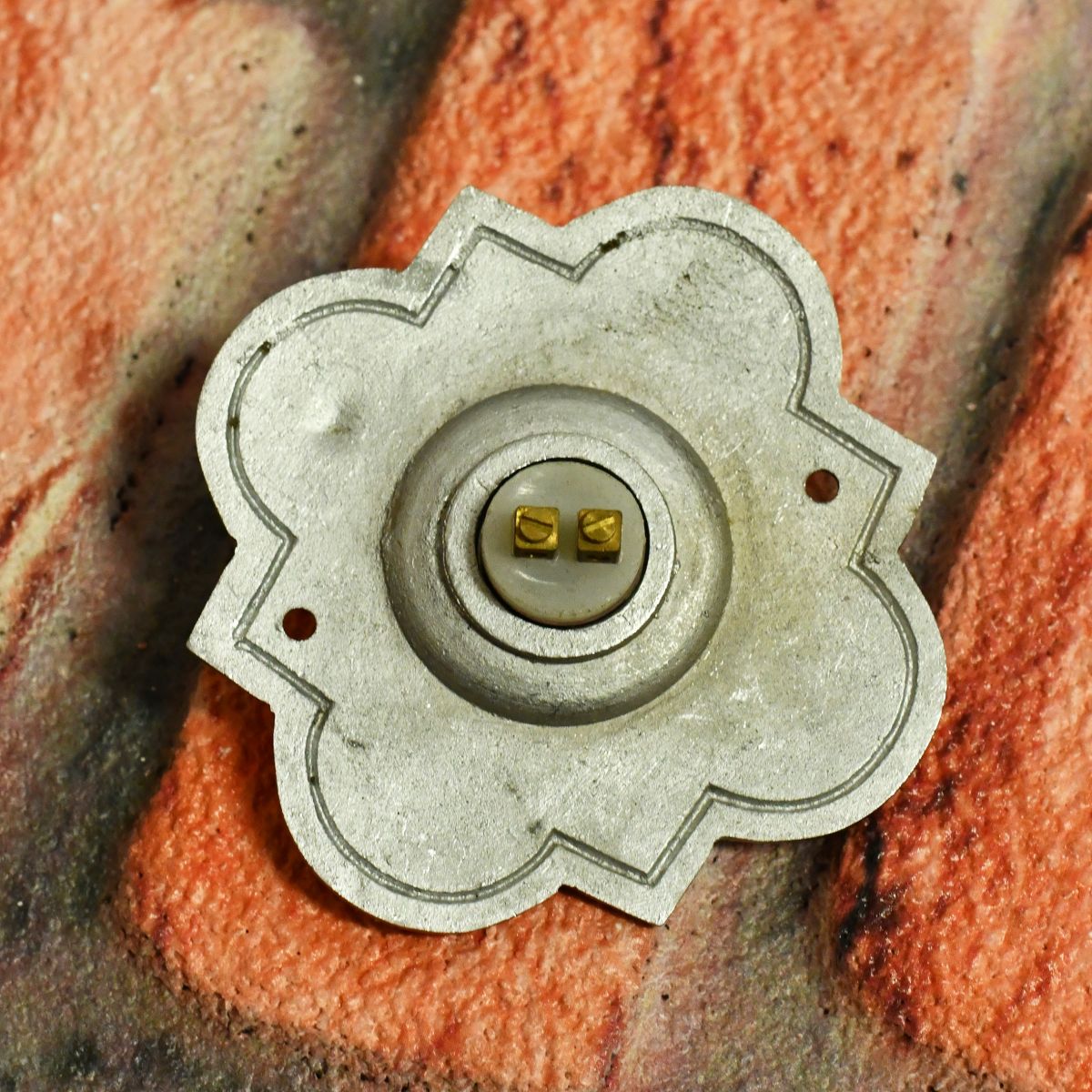 Back of bell push showing terminals for wiring chime