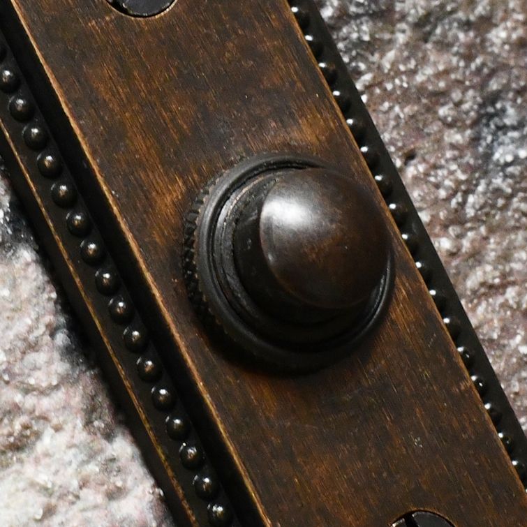 close up of door bell button