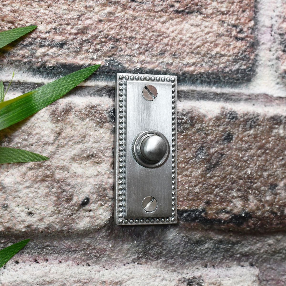 Rectangle period door bell on brick wall  Rectangle period door bell on brick wall